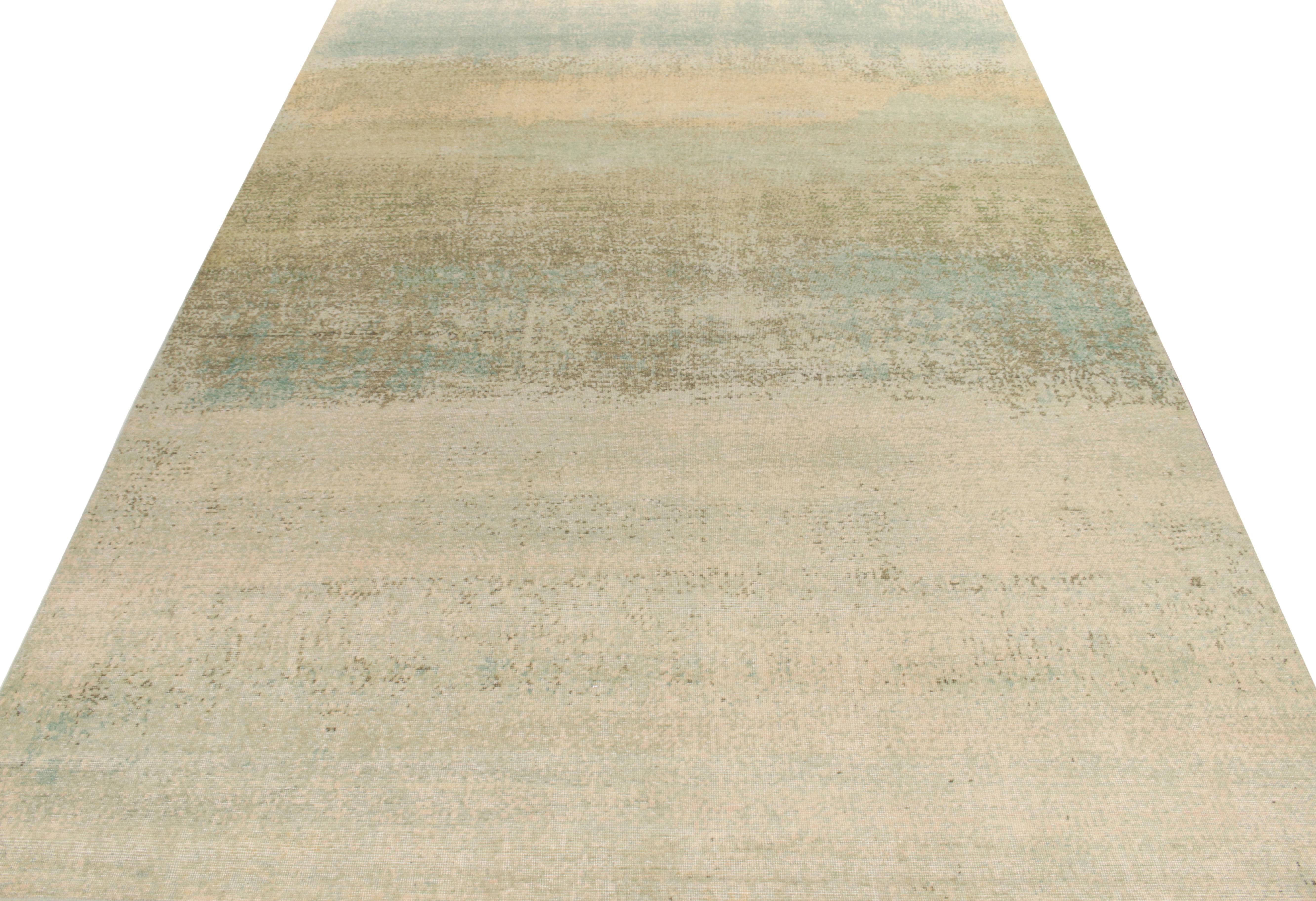 Hand-knotted in wool, a 10 x 14 distressed modern rug from Rug & Kilim’s Homage Collection featuring color gradient in sea blue, olive green & gold hues lending a shabby chic vibe for a refreshing take in abstract, painterly style. Carrying