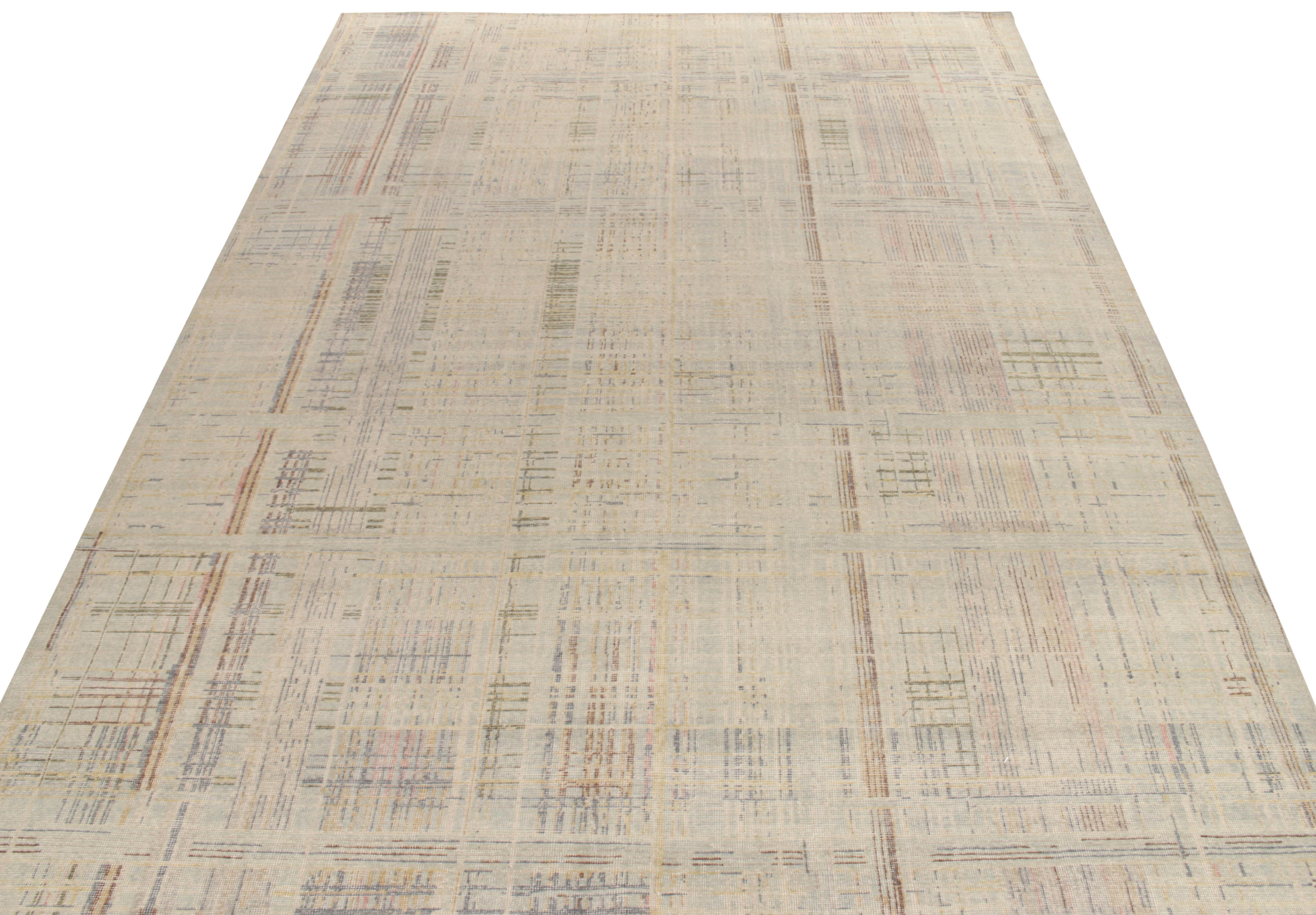 Witnessing a dedicated play of geometry, color & texture, this hand-knotted piece from Rug & Kilim’s Homage Collection pays tribute to distressed style in a 10x14 contemporary rug. Bearing abstract elements, the geometric patterns in blue, grey,