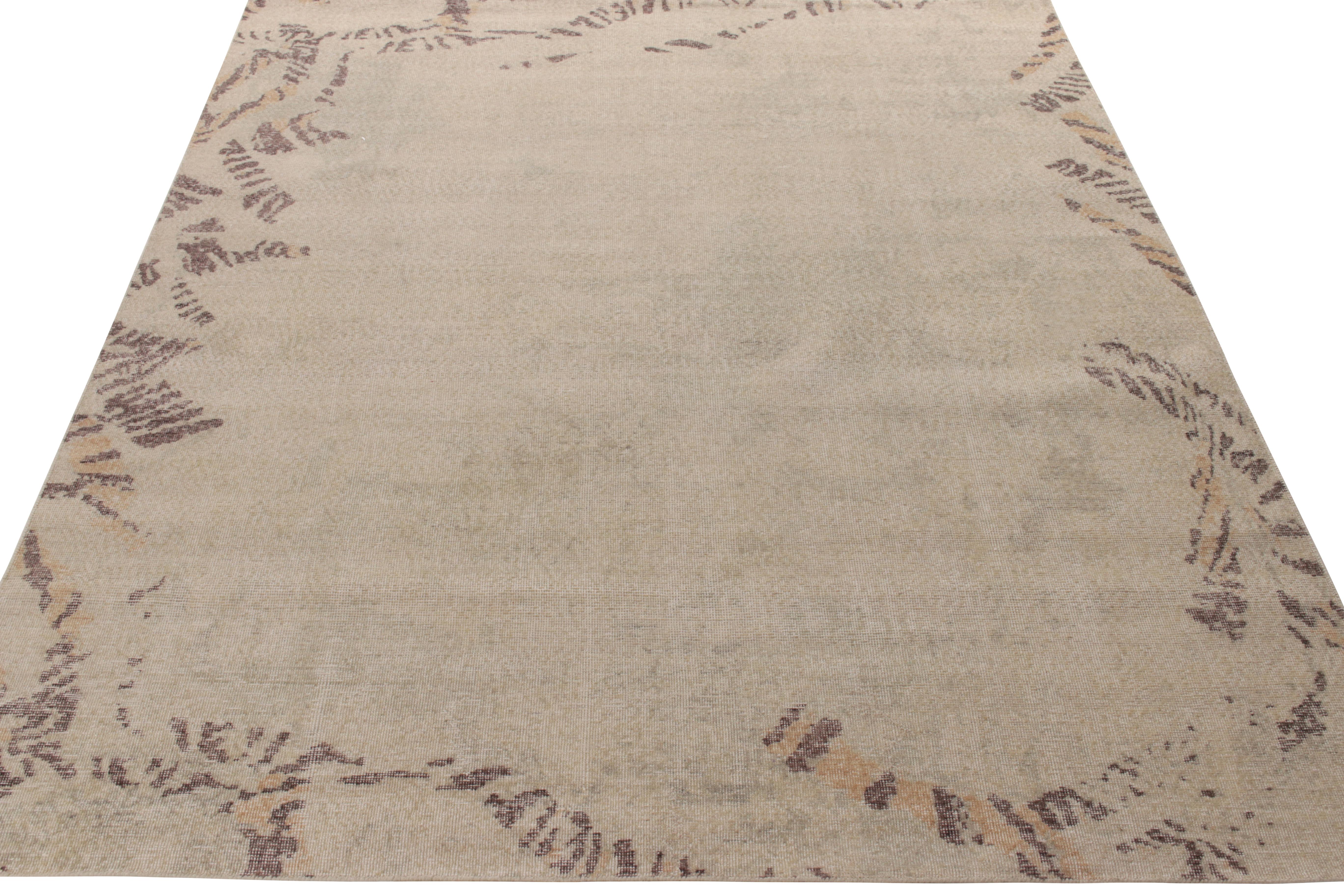Hand-knotted in wool, an 8 x 10 drawing from Rug & Kilim’s Homage collection showcasing a subtle, muted pattern in cream, beige & brown colorways close to the edges yielding an open field leaving ample room for imagination. Connoisseurs may note the