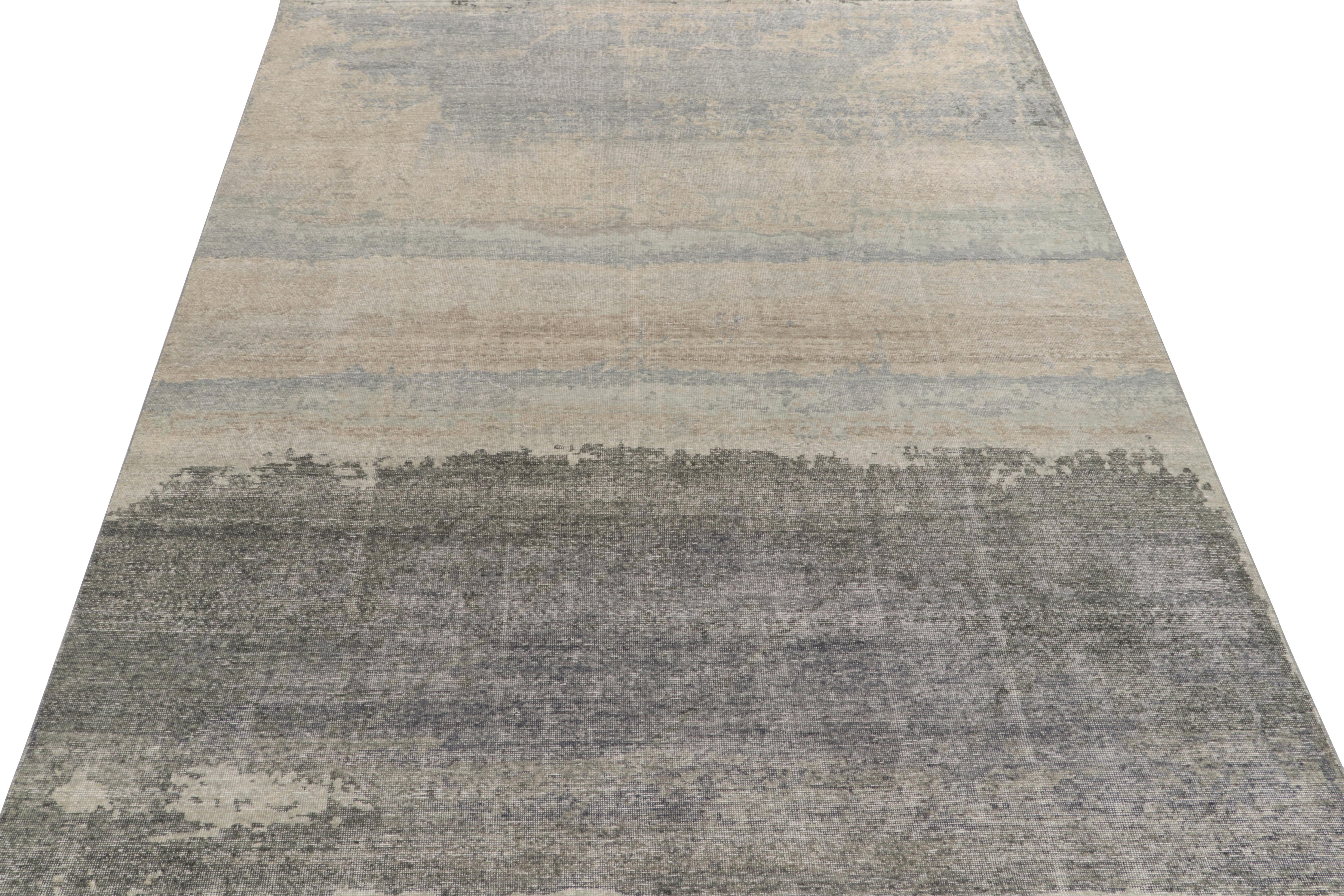 From Rug 
Kilim’s Homage collection, a 9x12 distressed style abstract rug enjoying the positive negative play of gray, blue 
beige to perfectly complement the shabby chic vibe of this celebrated line. Further enjoying an east-to-maintain,