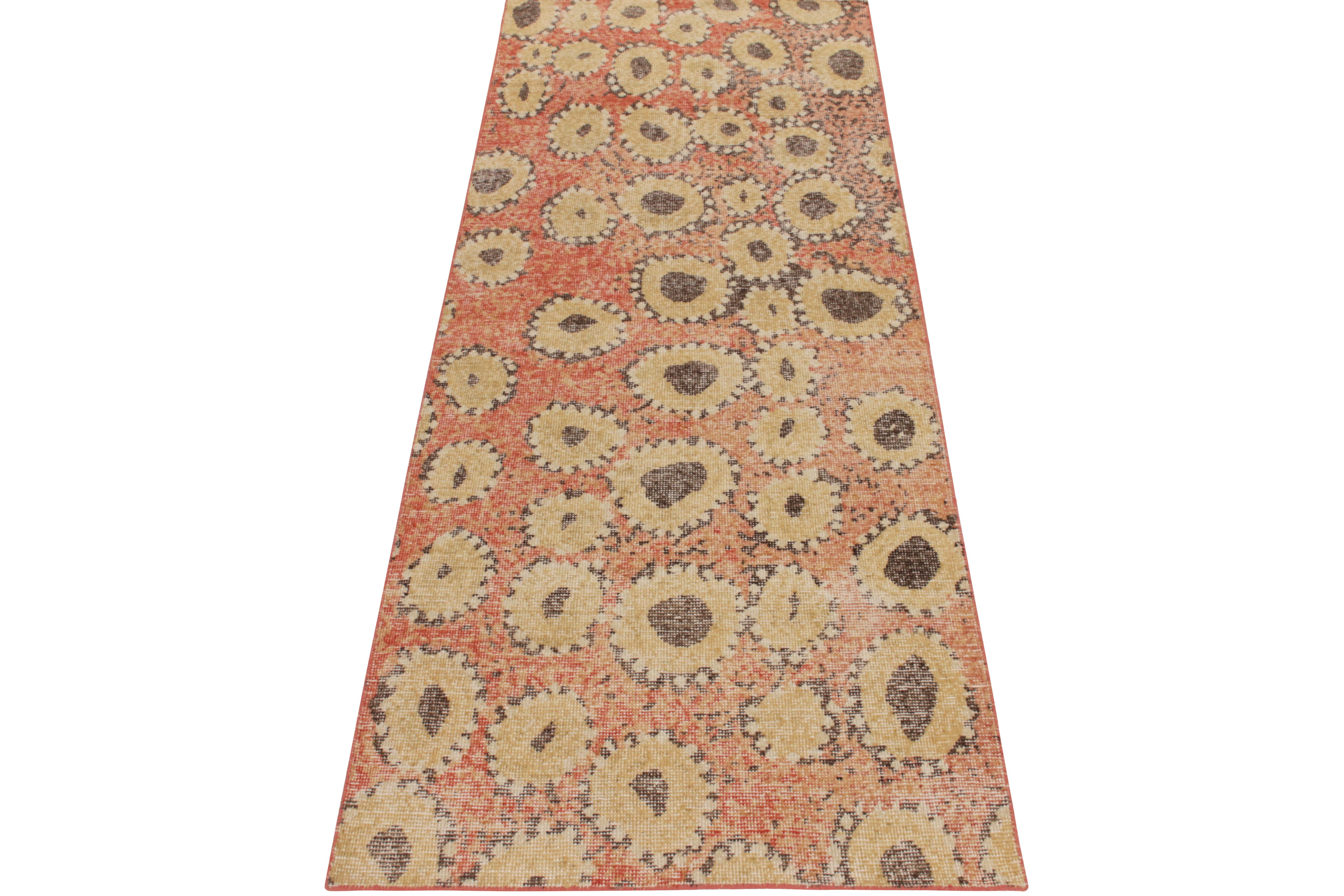 A 3x8 distressed style runner from Rug & Kilim’s Homage collection emphasising on funky, retro geometry with circles in gold, muted brown & white—all lying comfortably on the tangerine background further complementing the shabby chic appeal of this