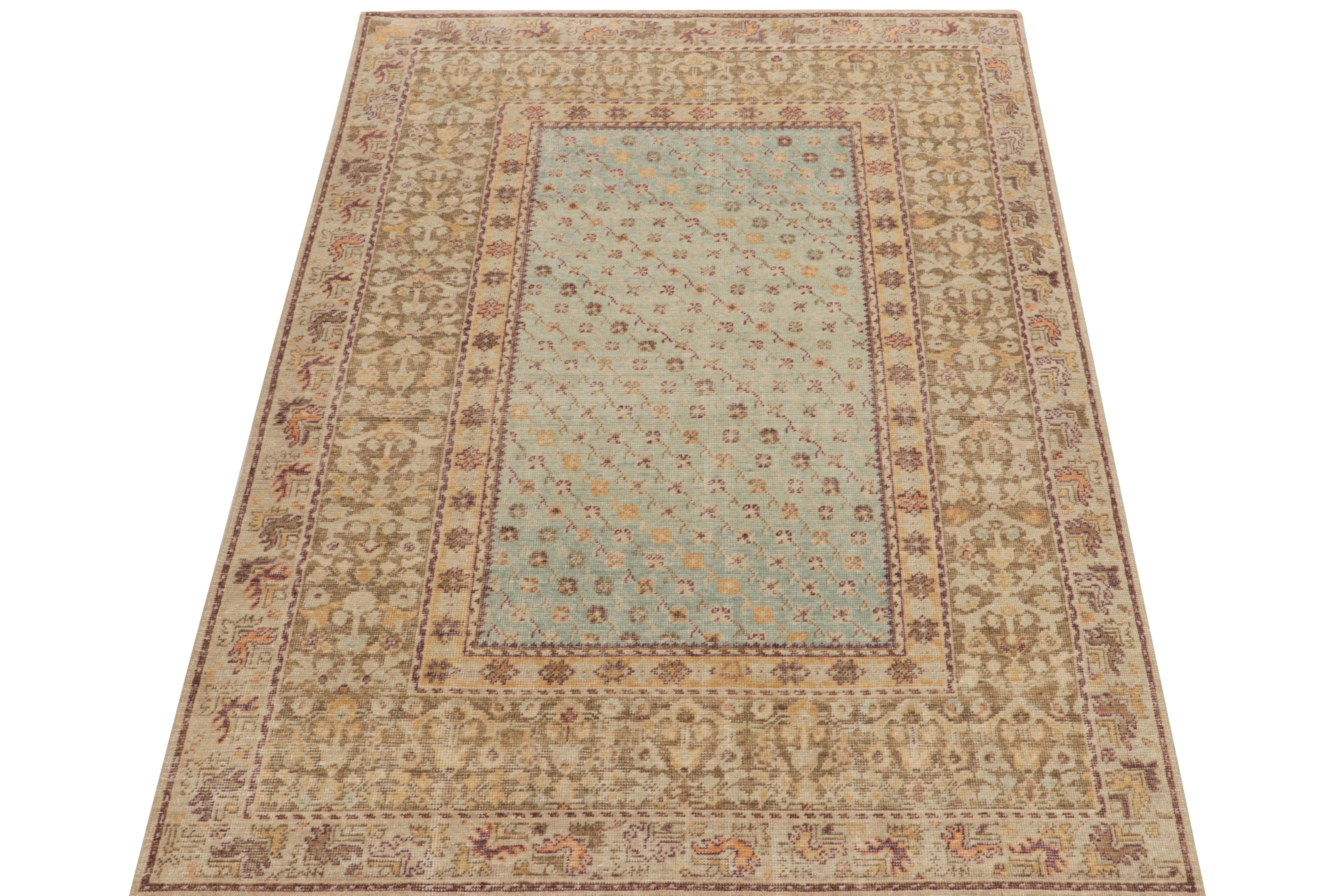 A 6 x 9 distressed style rug from Rug & Kilim’s coveted Homage Collection, enjoying an artful hand-knotted wool in low-pile shabby-chic texture. Inspired by tribal kilim styles, this carpet relishes gentle tones of blue, beige, brown, purple & gold