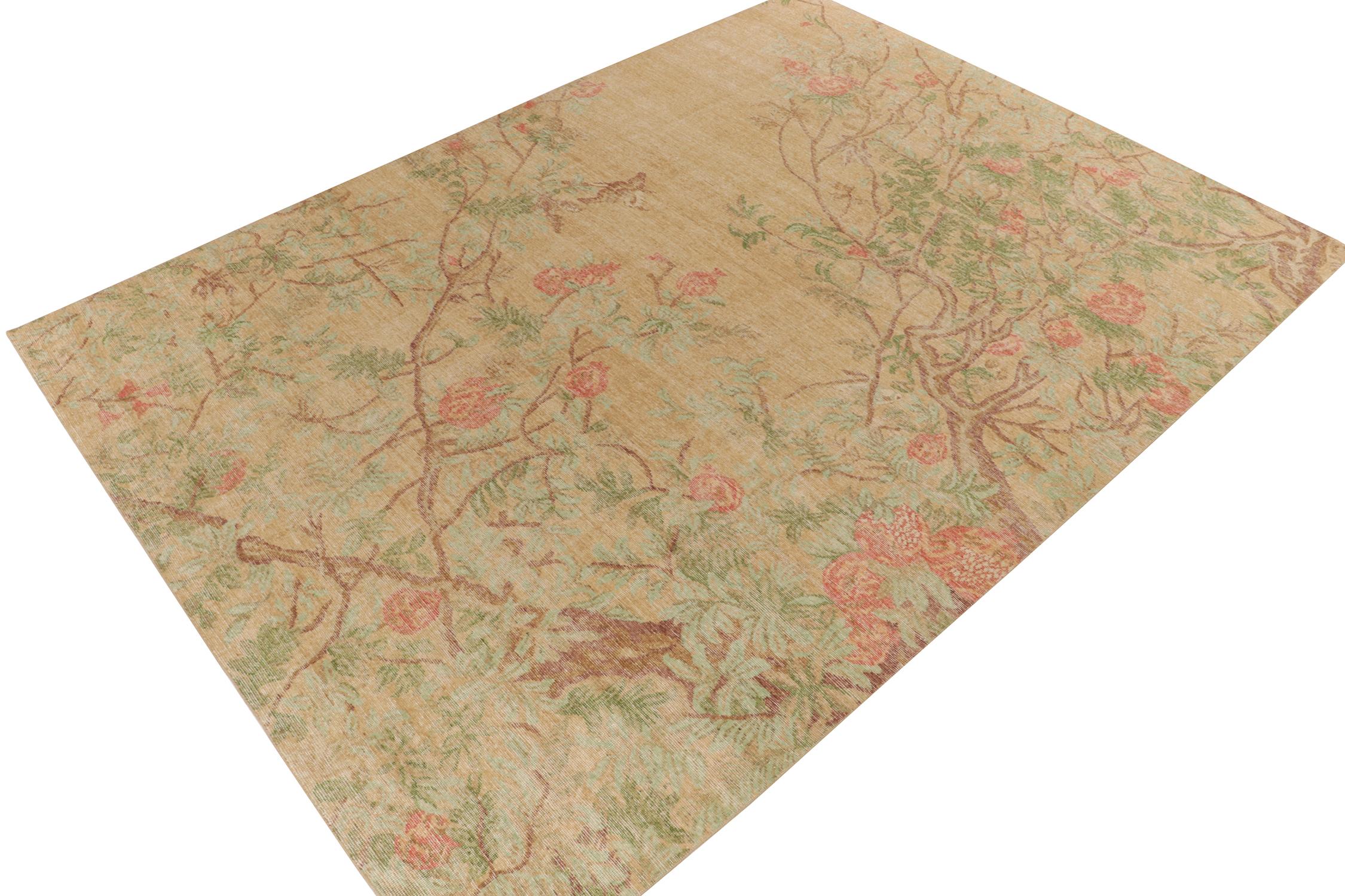 A 10x14 distressed style rug from our Homage Collection, featuring a classical floral pattern & subtle animal pictorials in red, gold, brown and forest green tones—transitioning beautifully with the low-pile texture for an alluring shabby chic