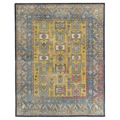 Rug & Kilim's Distressed Tribal Style Rug in Blue and Yellow Geometric Pattern