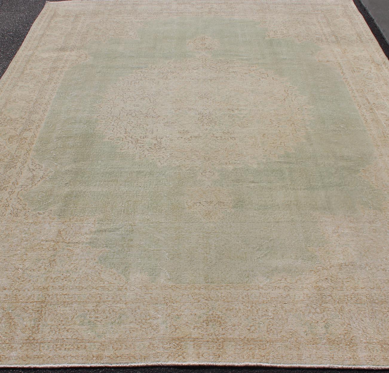 Distressed Turkish Carpet with Floral Medallion in Light Green, Tan and Taupe For Sale 3