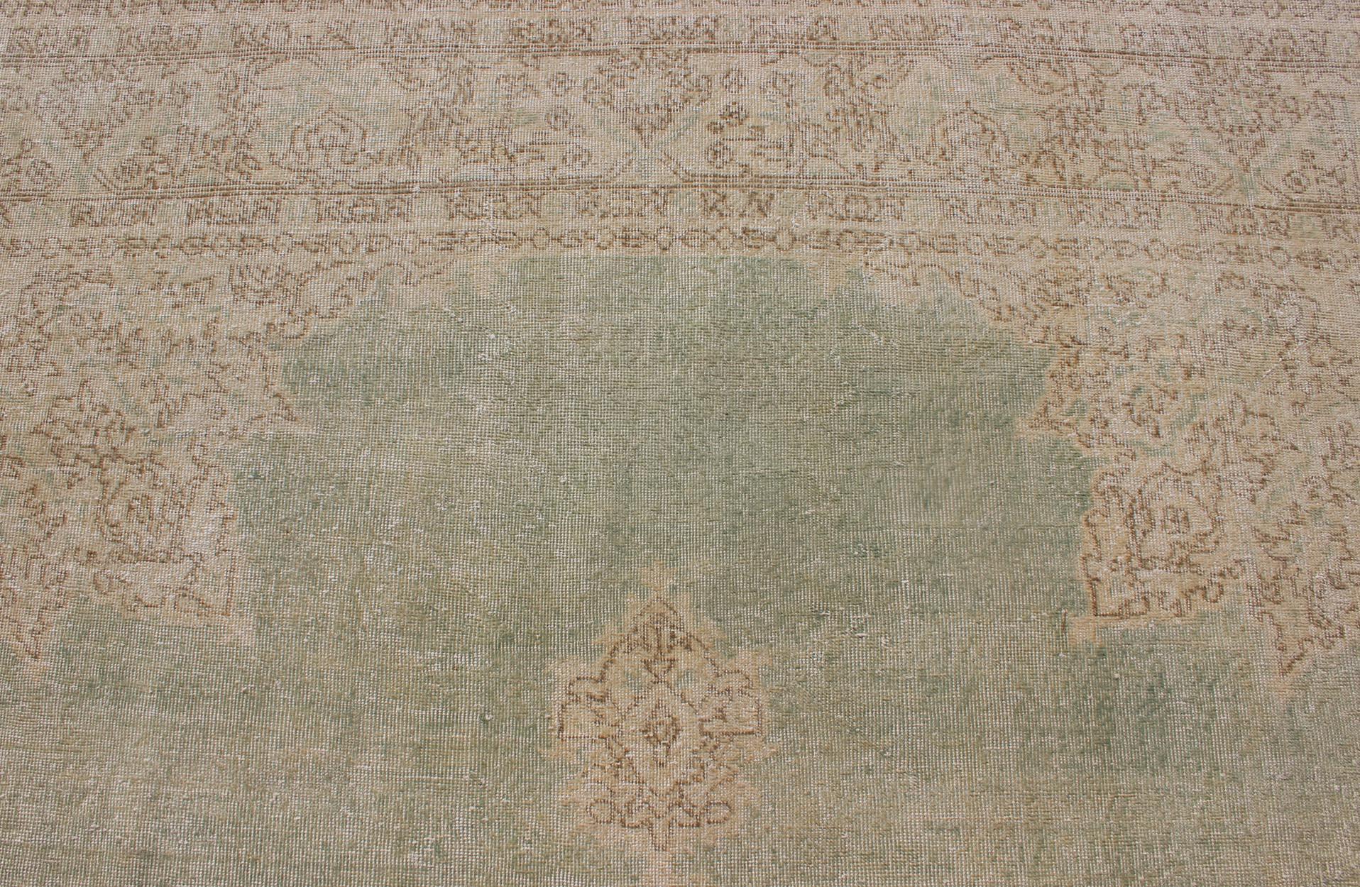 Distressed Turkish Carpet with Floral Medallion in Light Green, Tan and Taupe For Sale 6
