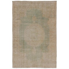 Vintage Distressed Turkish Carpet with Floral Medallion in Light Green, Tan and Taupe