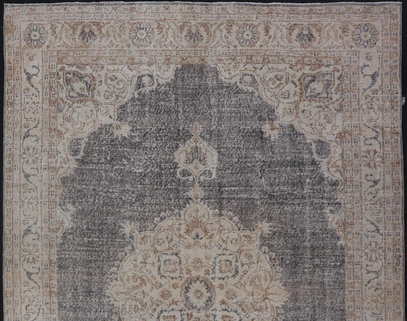 20th Century Distressed Turkish Carpet with medallion Design in Dark Gray, Lt. Brown & Cream For Sale