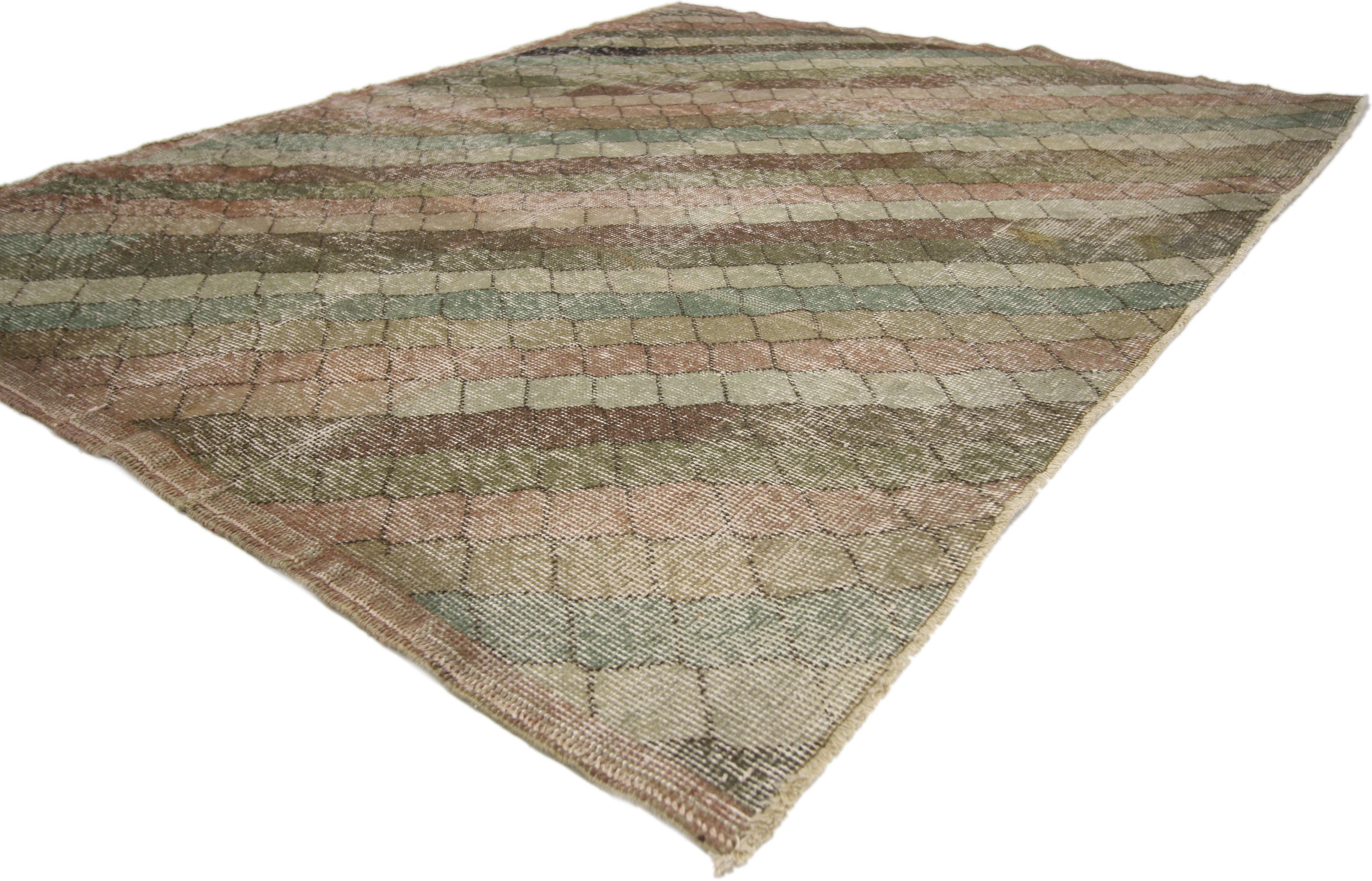 51009 Zeki Muren Distressed Vintage Turkish Sivas Rug with Rustic Art Deco Style. Warm and stylize combined with a bold, yet subtle pattern, this hand knotted wool distressed vintage Turkish Sivas rug embodies Art Deco style with a modern artisan
