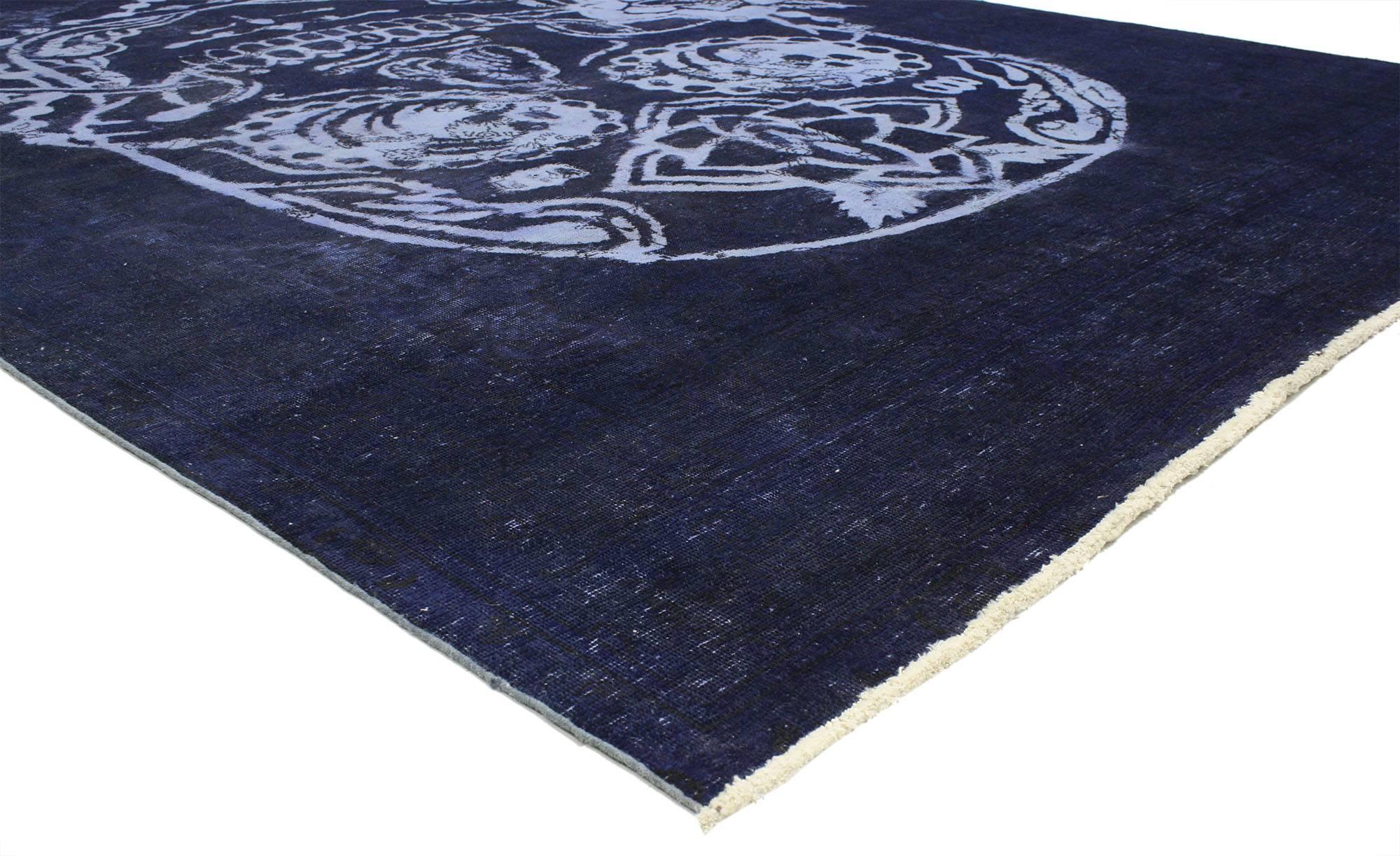 80433, Distressed Vintage Overdyed Blue Skull Rug 08'01 x 11'06. Drawing inspiration from Alexander McQueen, Día de los Muertos, and Disney's Coco movie, this hand knotted wool distressed vintage Calavera skull area rug has been crafted from a