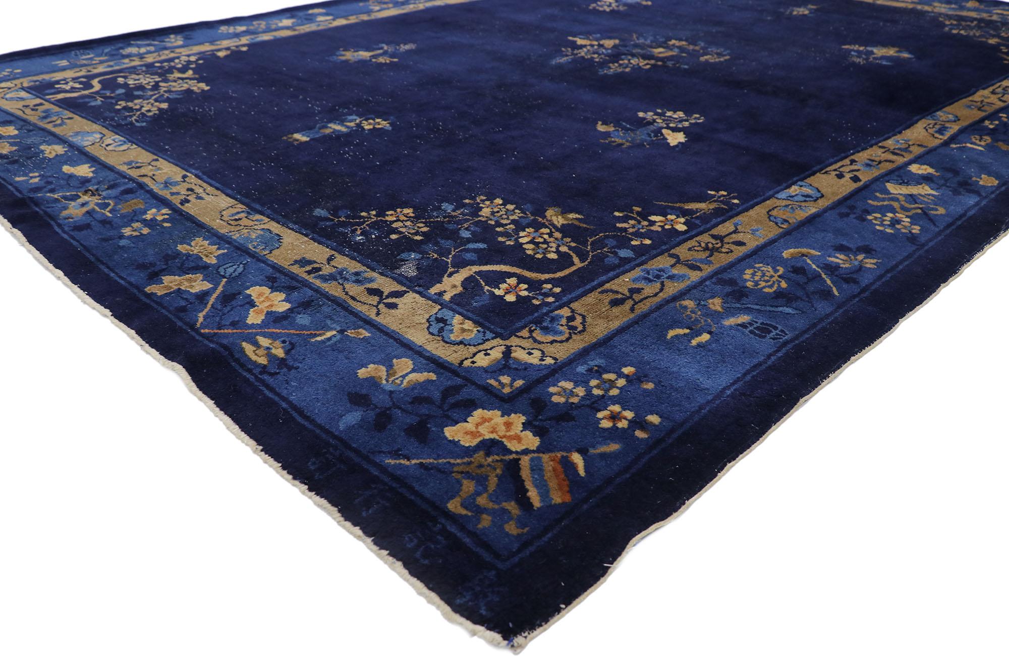 ?78125 Distressed Vintage Chinese Peking rug with Art Deco Style 07'06 x 10'07. ?With Art Deco style, this hand knotted wool distressed vintage Chinese Peking rug features an elegant central open medallion dotted with flowering vases across the