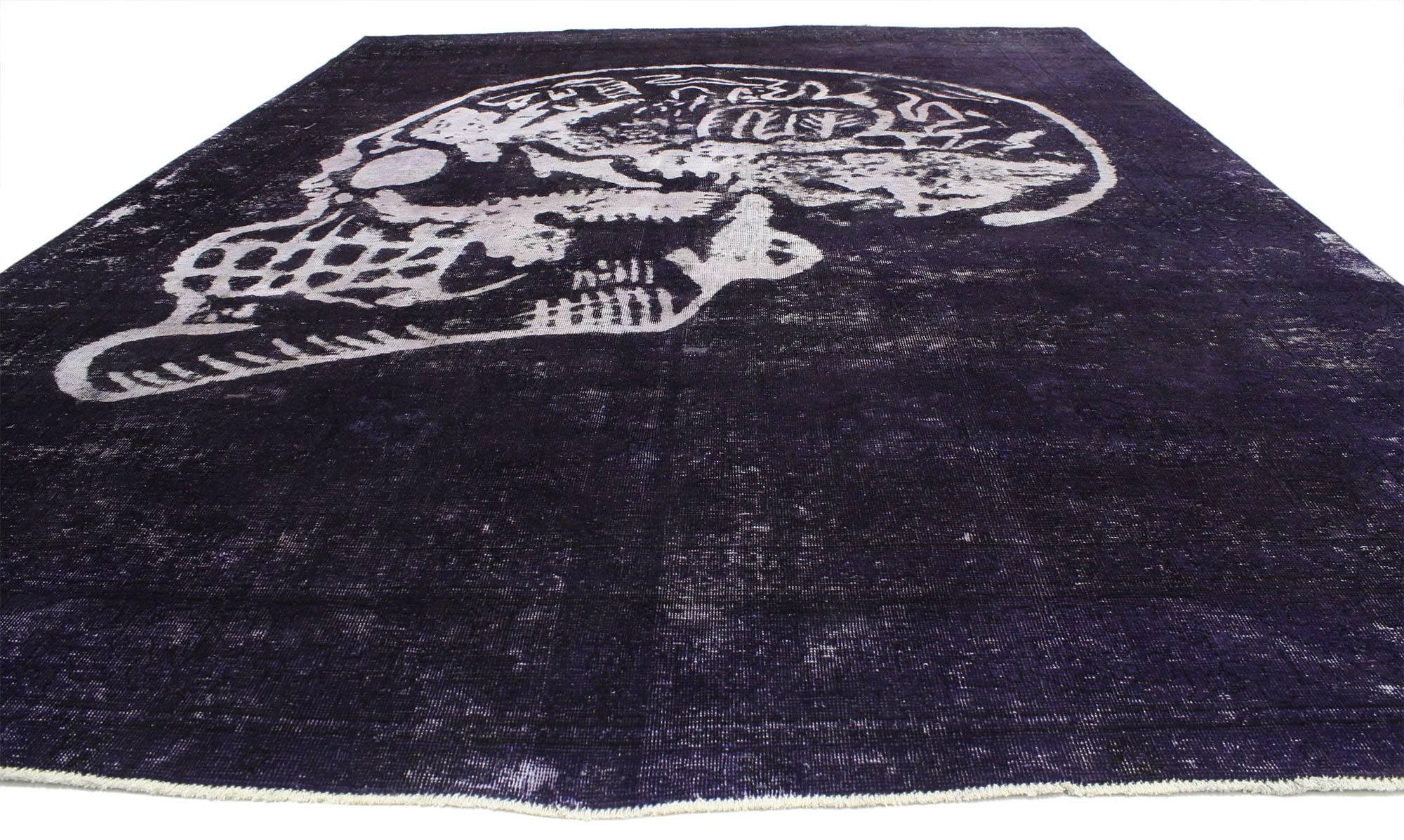 80430, distressed vintage Craniotomy purple skull area rug inspired by Alexander McQueen. This distressed vintage Persian rug makes a statement with its saturated violet-purple color scheme and graphic skull design. The hand knotted wool skull rug