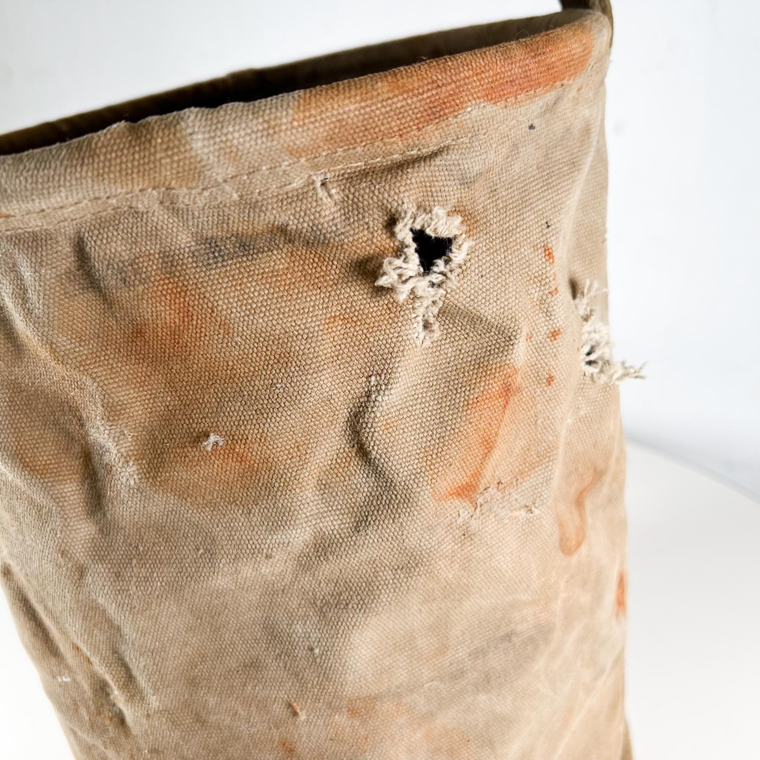 old fashioned canvas water bags