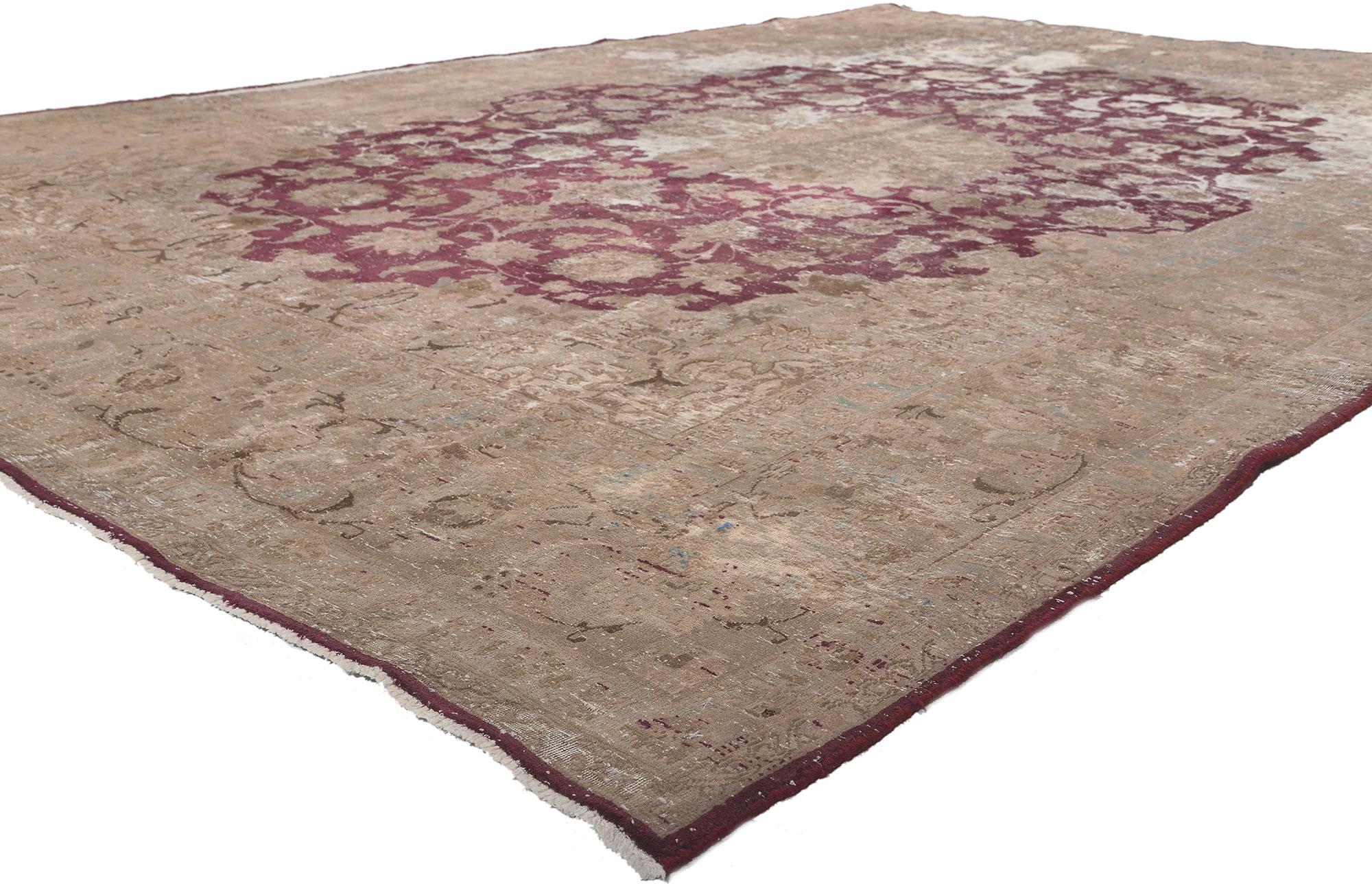 78594 Distressed Vintage Persian Kashan Rug, 08'01 x 11'09.
Rugged beauty meets weathered charm in this distressed vintage Persian Kashan rug. The faded botanical design and rustic earth-tone colors woven into this piece work together creating a