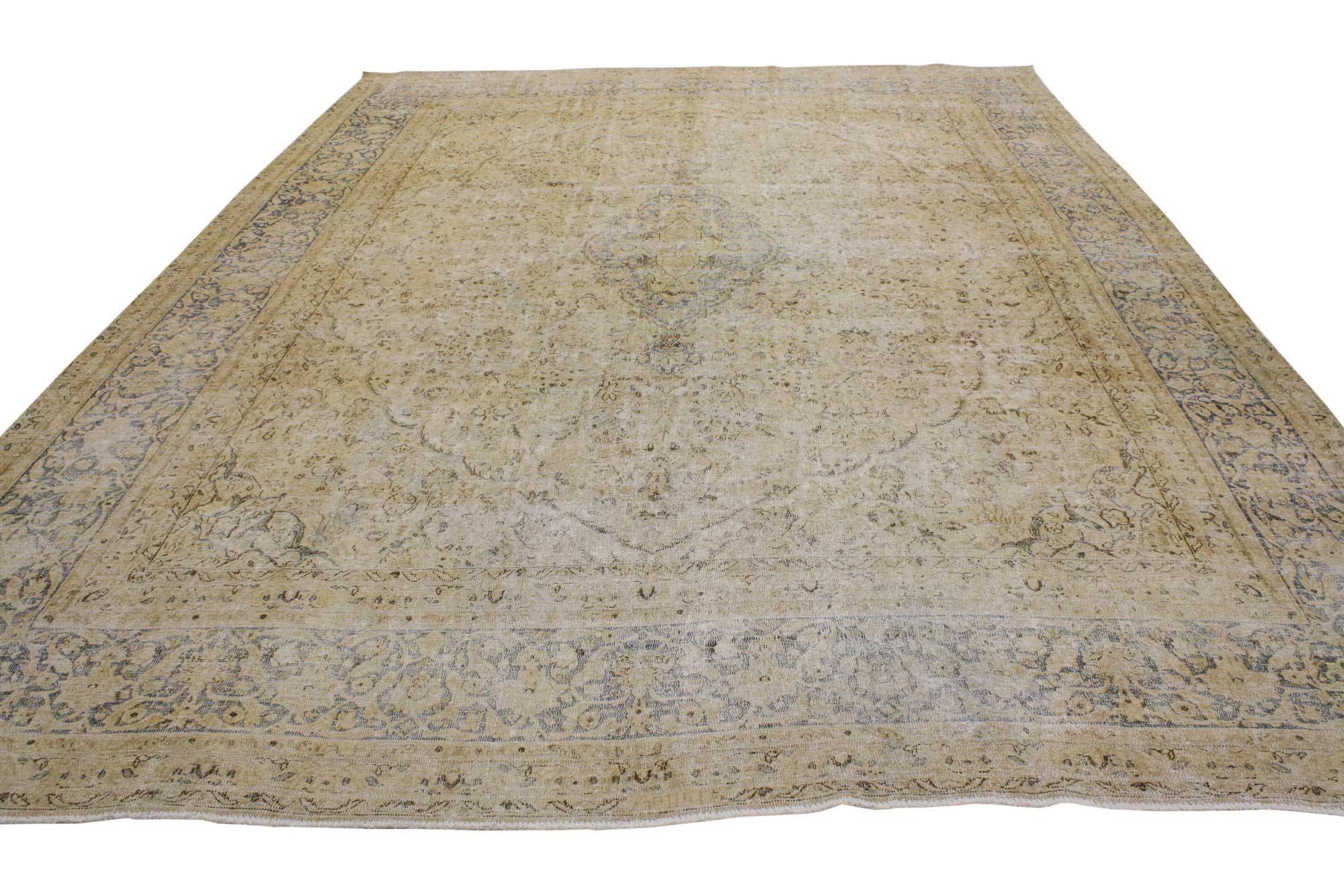 80312 Distressed Vintage Persian Kerman Area Rug with English Country Cottage Style 09'03 x 13'00. Warm and inviting with rustic sensibility, this hand-knotted wool vintage Persian Kerman rug is poised to impress. The antique washed field features a