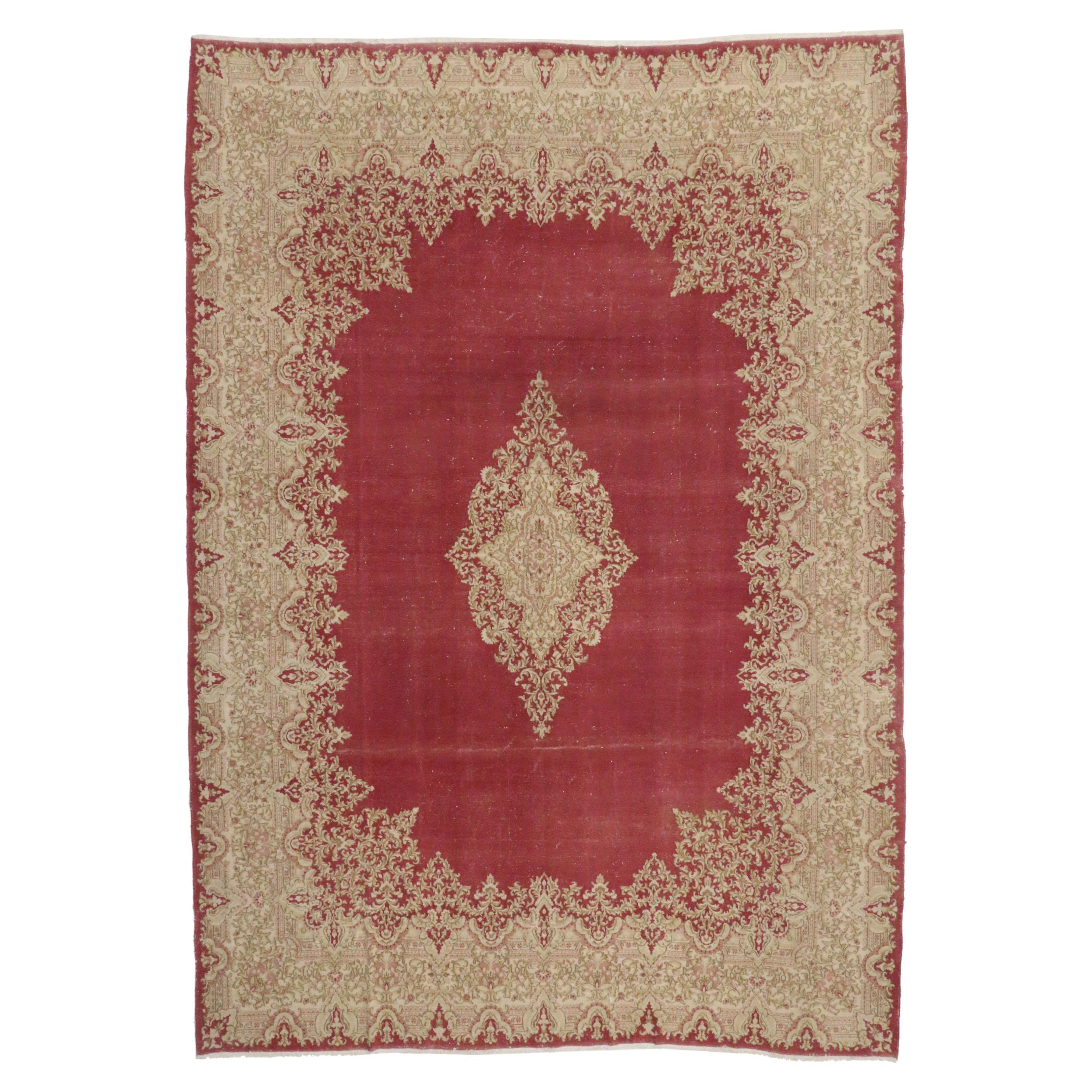 Distressed Vintage Persian Kirman Area Rug with French Victorian Style For Sale