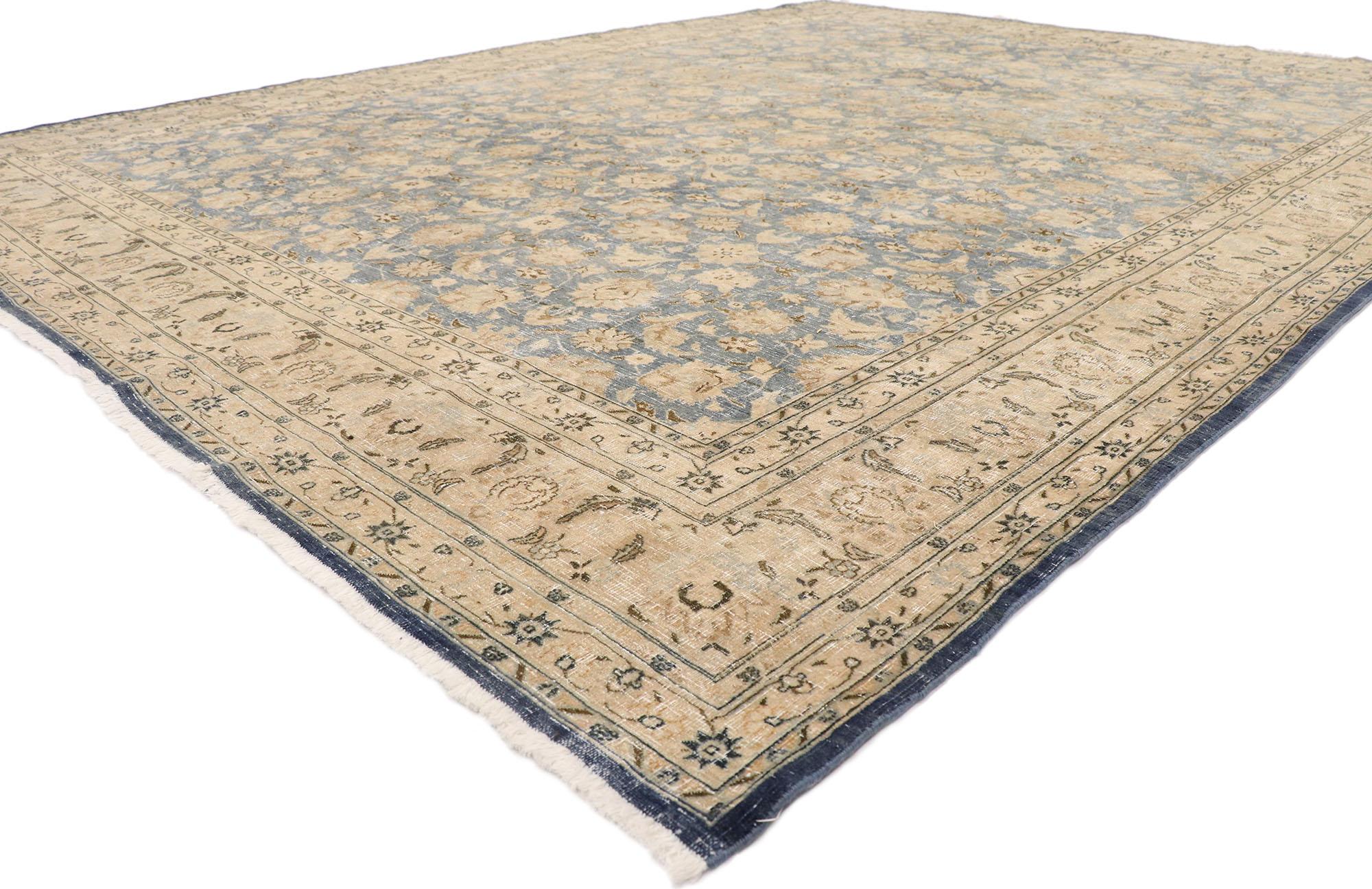 ?60973 Distressed Vintage Persian rug with Rustic Coastal style 09'09 x 12'07. ??Understated elegance combined with cool blue hues and warm taupe tones, this hand-knotted wool vintage Persian rug is poised to impress. The antique washed field