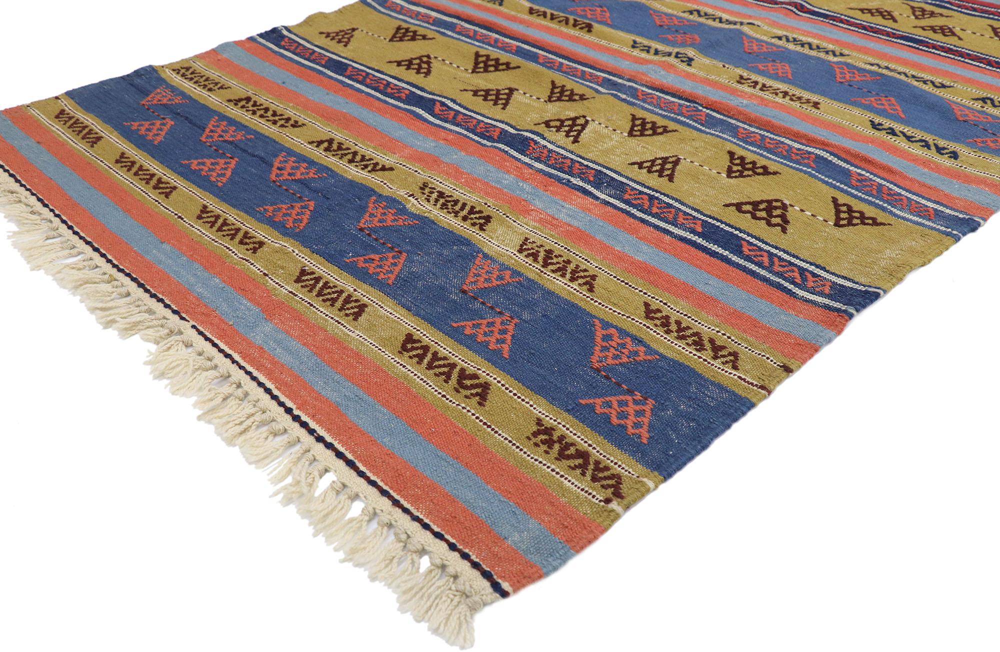77813, distressed vintage Persian Shiraz Kilim rug with Rustic Tribal style 04'03 x 06'02. Full of tiny details and a bold expressive design combined with vibrant colors and tribal style, this hand-woven wool distressed vintage Persian Shiraz Kilim