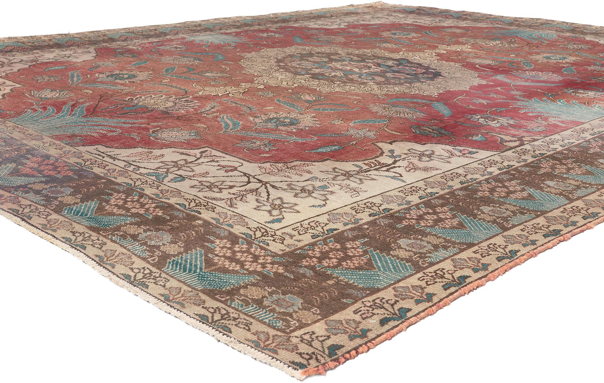 75544 Vintage Persian Tabriz Rug, 08'09 x 10'09. 
Craftsman style meets rustic elegance in this hand knotted wool vintage Persian Tabriz rug. The naturalistic forms and time-softened colors woven into this piece work together resulting in a relaxed