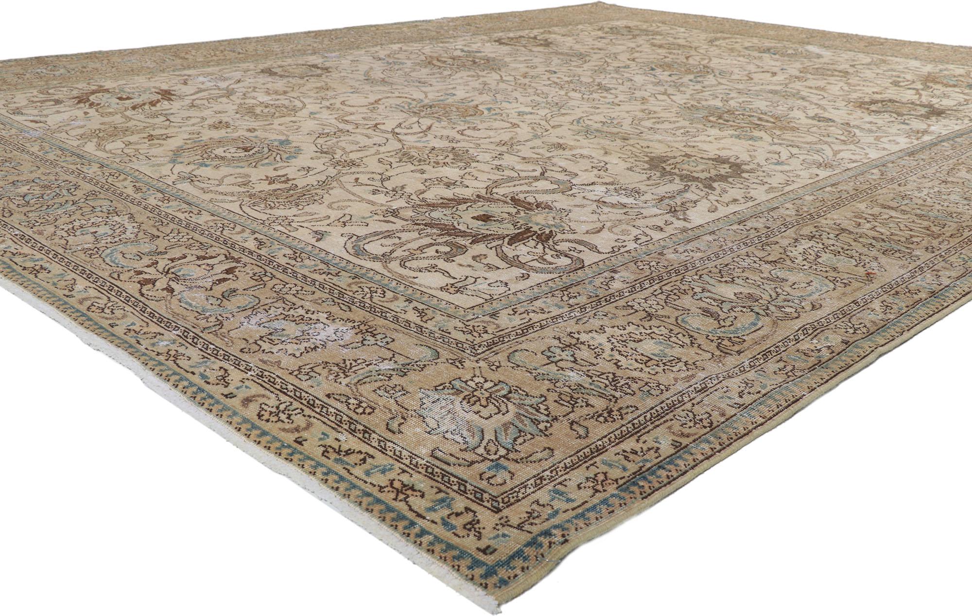 61015 Distressed Vintage Persian Tabriz Rug 09'11 x 12'09. With its effortless beauty and lovingly time-worn composition, this hand-knotted wool distressed vintage Persian Tabriz rug will take on a curated lived-in look that feels timeless while