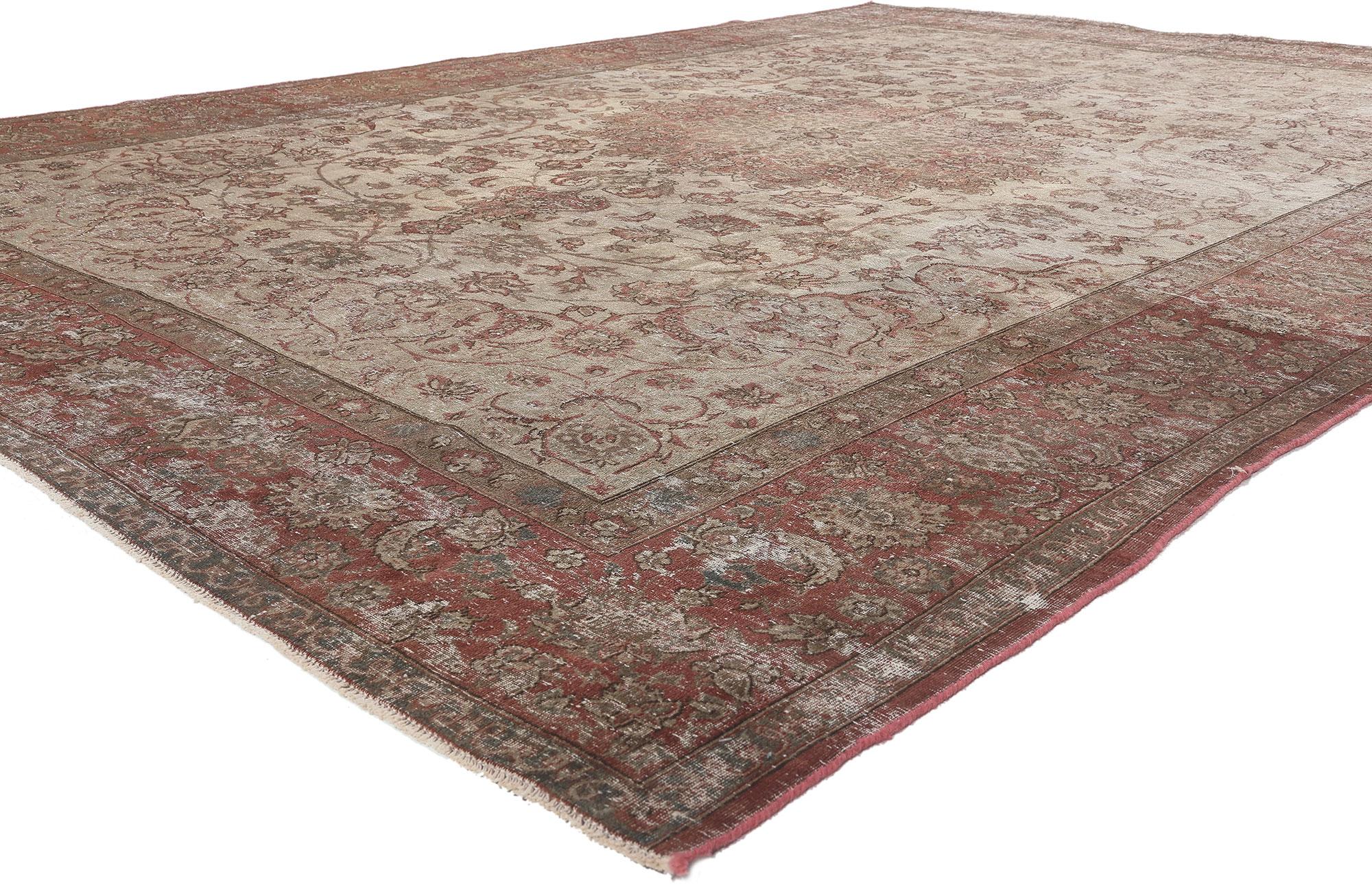 78585 Distressed Vintage Persian Tabriz Rug, 08'05 x 12'01.
Rustic elegance meets unpretentious and simple in this distressed vintage Persian Tabriz rug. The faded floral pattern and earthy colorway woven into this piece work together creating an