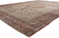 Distressed Vintage Persian Tabriz Rug with Faded Earth-Tone Colors