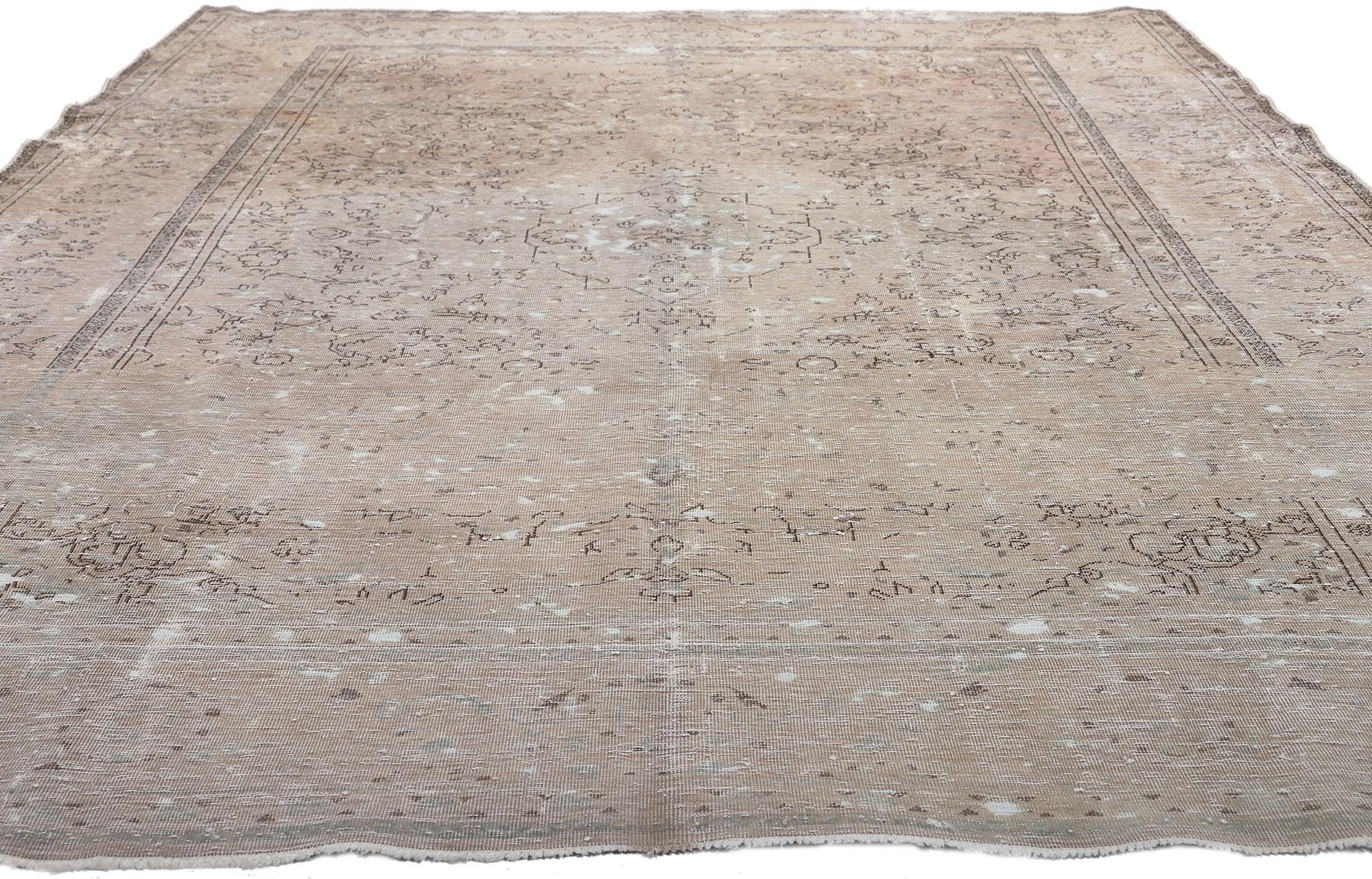 Industrial Distressed Vintage Persian Tabriz Rug with Faded Earth-Tone Colors For Sale