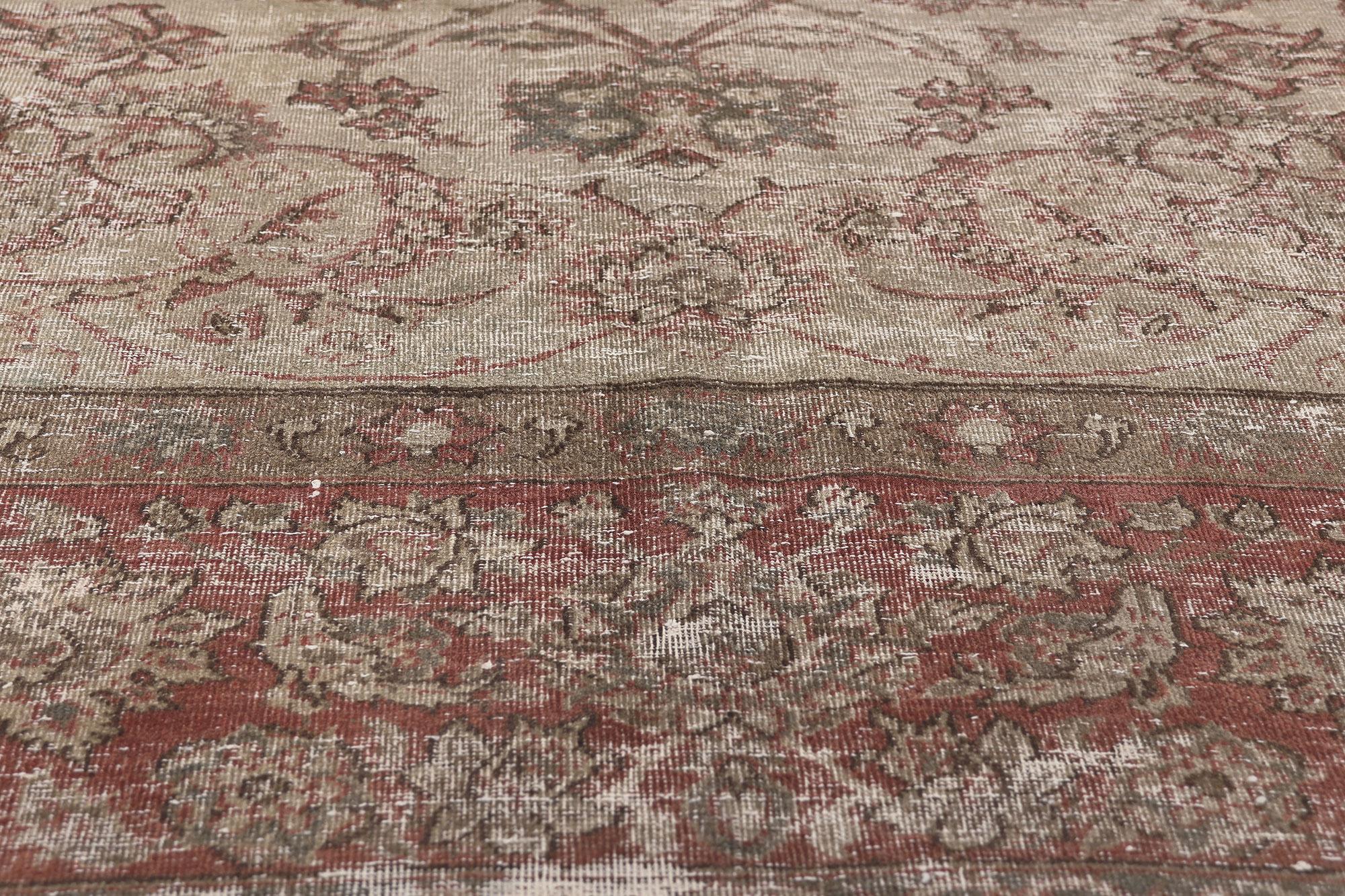 Hand-Knotted Distressed Vintage Persian Tabriz Rug with Faded Earth-Tone Colors For Sale