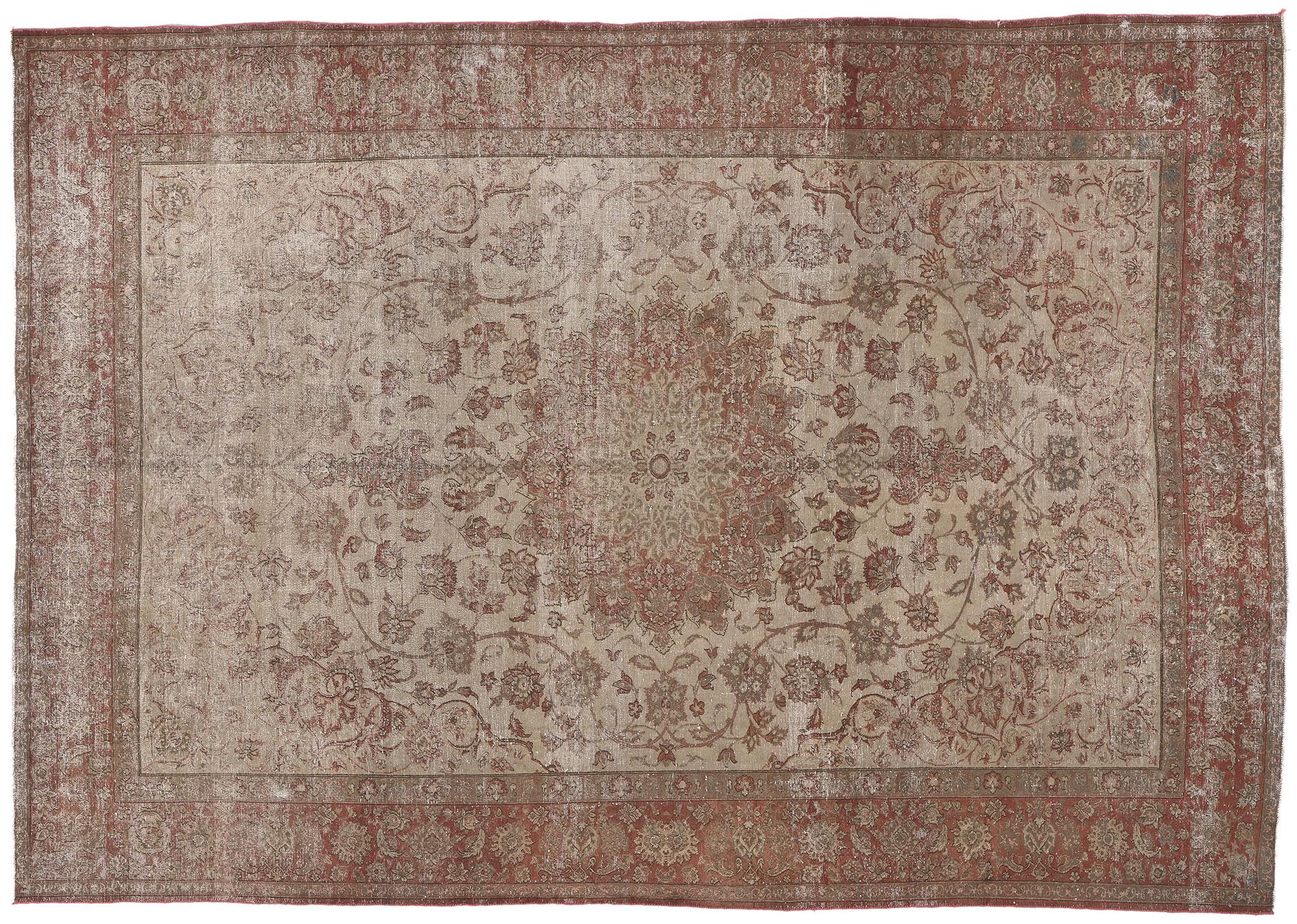 Wool Distressed Vintage Persian Tabriz Rug with Faded Earth-Tone Colors For Sale