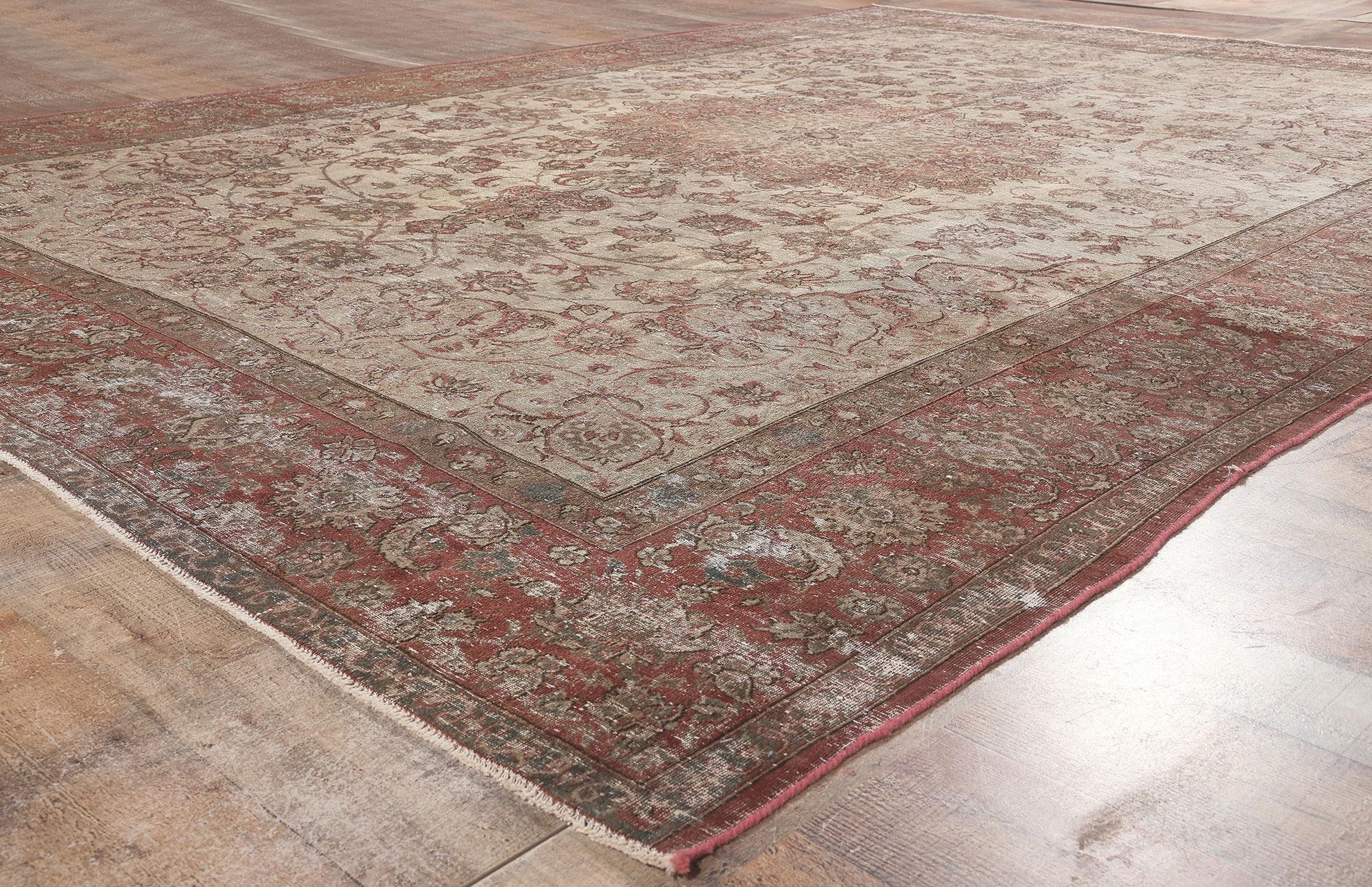 Distressed Vintage Persian Tabriz Rug with Faded Earth-Tone Colors For Sale 1