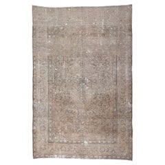 Distressed Vintage Persian Tabriz Rug with Faded Earth-Tone Colors