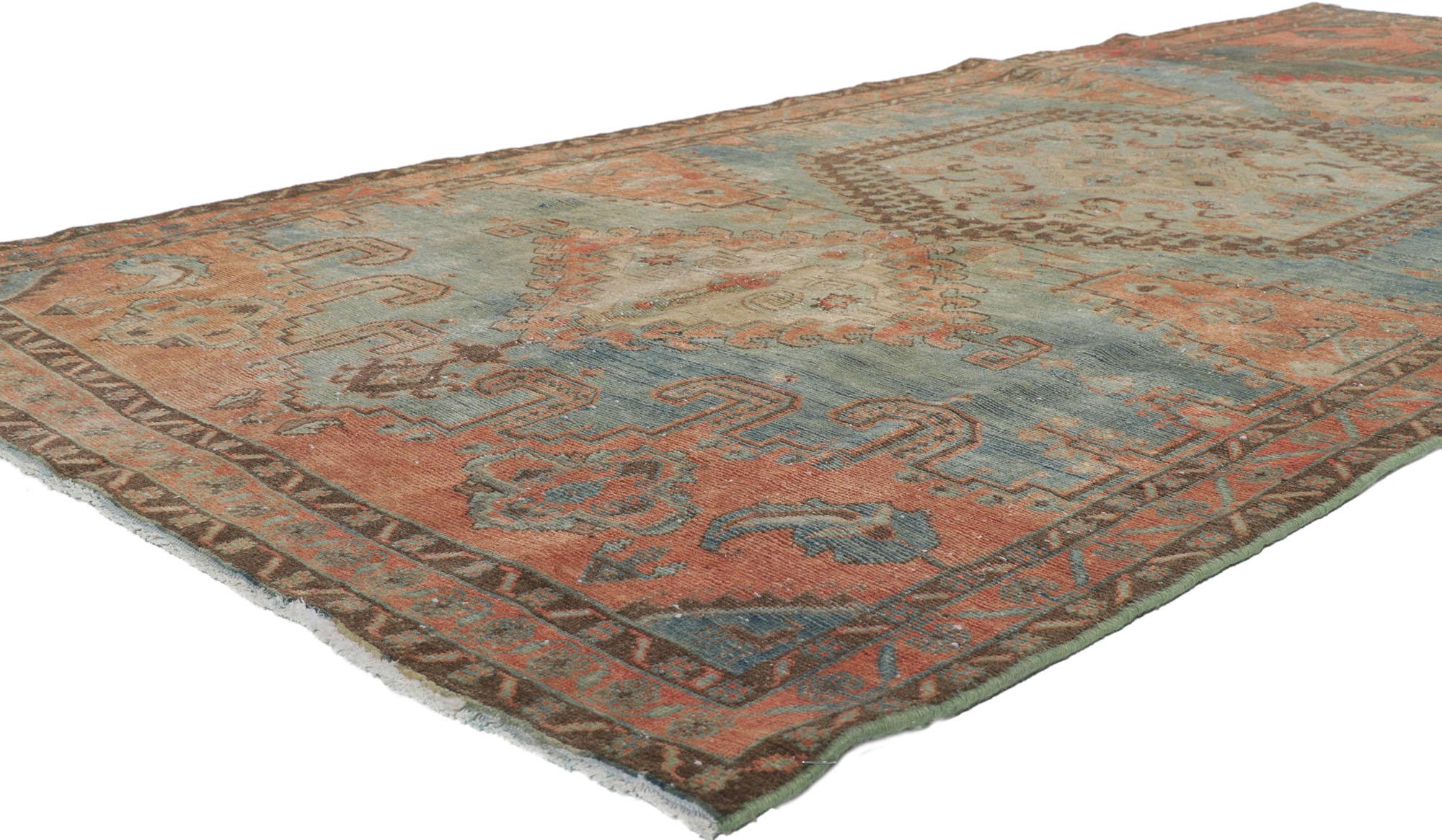 60978 Vintage-Worn Persian Viss Rug, 05'02 x 11'03.
Introducing a captivating fusion of tribal enchantment and rustic finesse, behold the beguiling hand-knotted wool vintage Persian Viss rug. This remarkable piece takes center stage on a mesmerizing