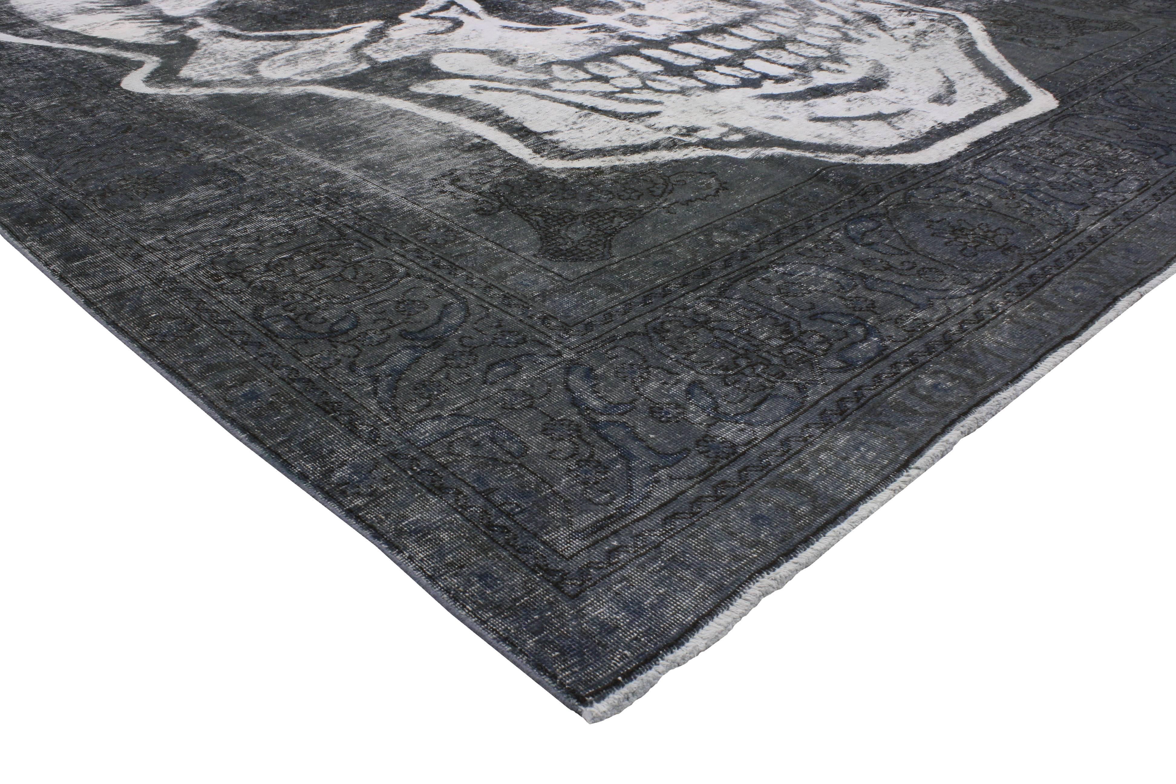 80275 Distressed Vintage Overdyed Skull Rug Inspired by Alexander McQueen 09'08 x 13'01. Showcasing an expressive design with artful craftsmanship and incredible detail, this hand knotted wool distressed vintage overdyed skull rug is a captivating