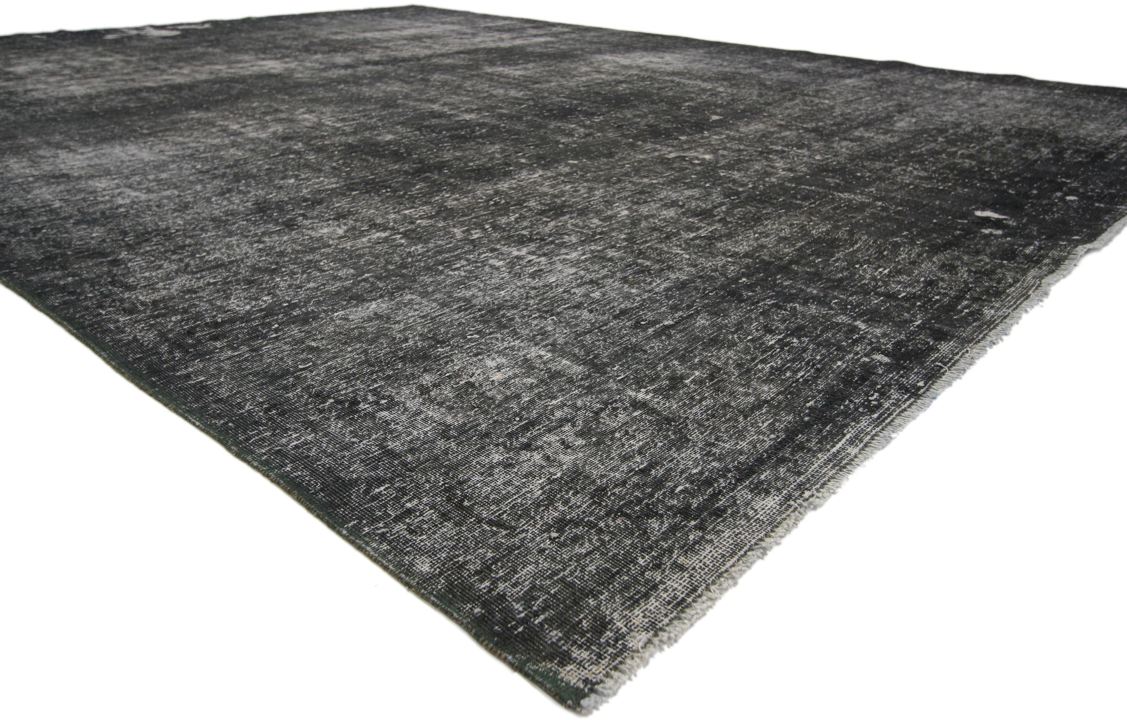 60671 Distressed Vintage Turkish Overdyed Rug with Modern Industrial Urban Luxe Style 10'00 x 13'02. Modern industrial style and Urban Luxe vibes collide in this hand knotted wool distressed vintage Turkish rug. It features a barely there botanical