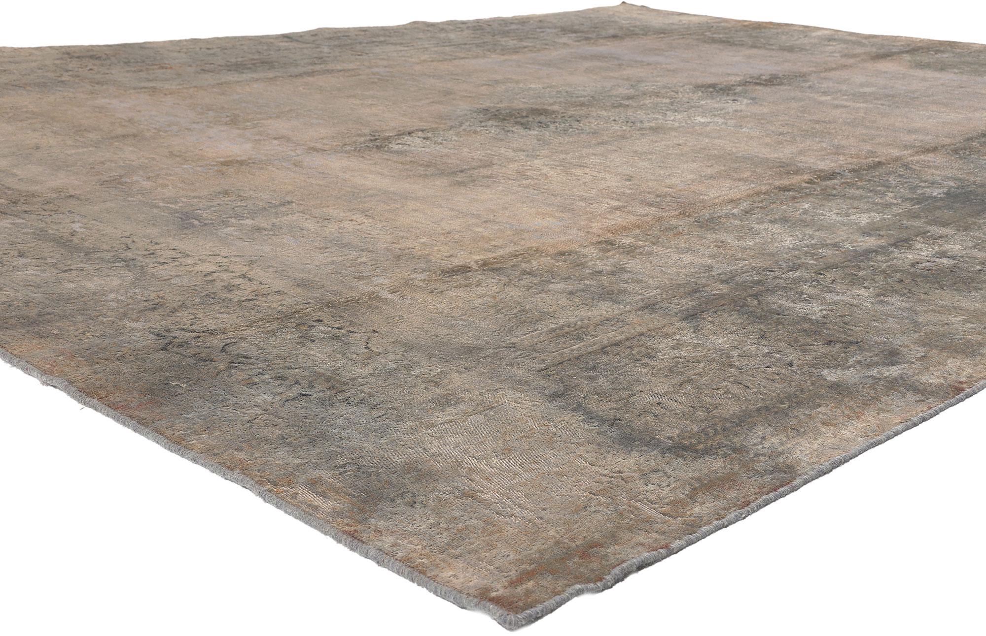 60616 Vintage Turkish Overdyed Rug, 09'10 x 12'11. 
Luxe utilitarian appeal meets industrial chic in this hand knotted wool vintage Turkish overdyed rug. The faded botanical design and earthy hues in this piece work together resulting in a look of