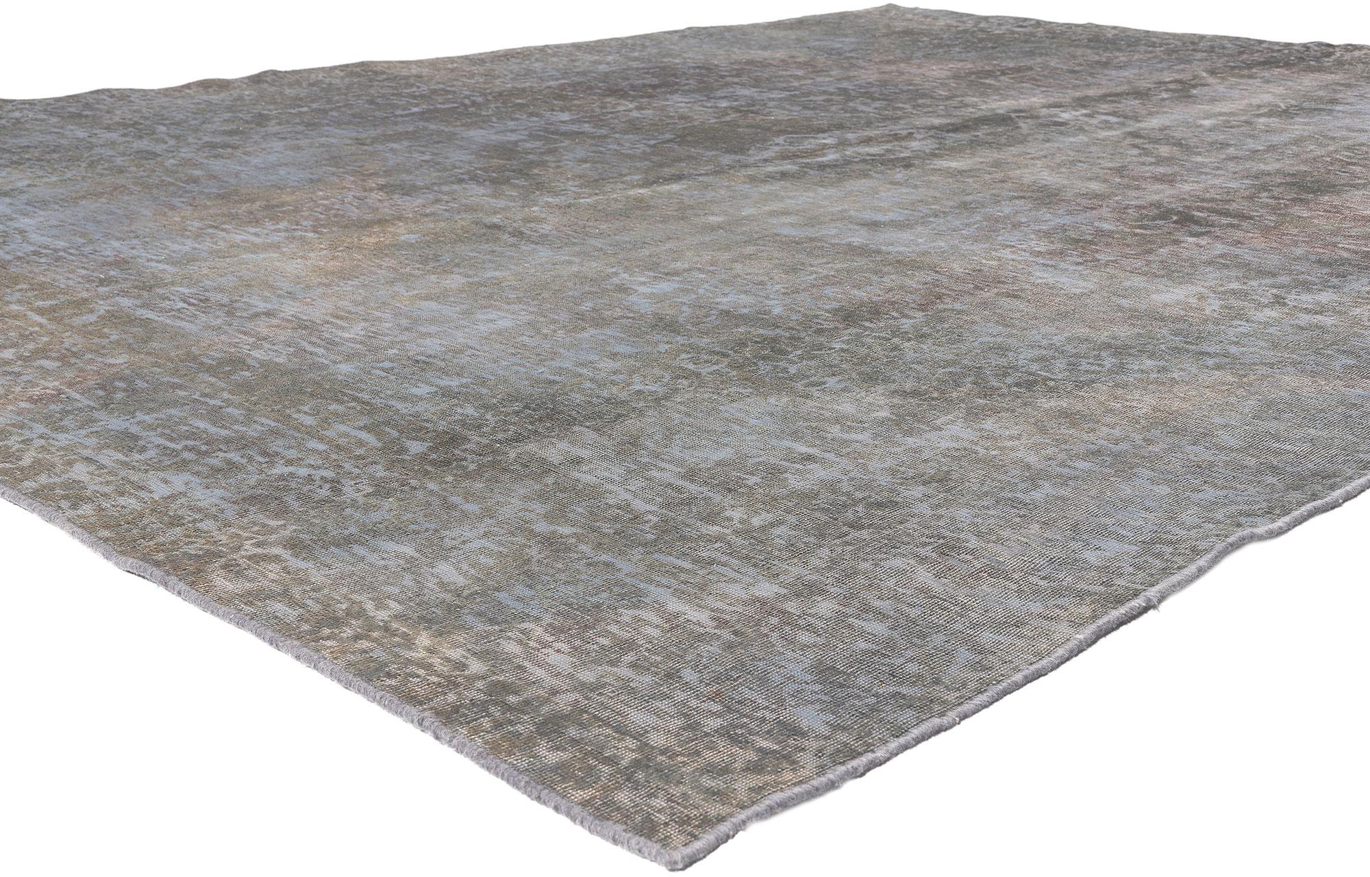 60607 Vintage Turkish Overdyed Rug, 09’05 x 12’05. 
​In the enthralling union of Modern Industrial and luxe utilitarian allure, behold this hand-knotted wool vintage Turkish overdyed rug. Picture the roots of utilitarian design, sprouting in New