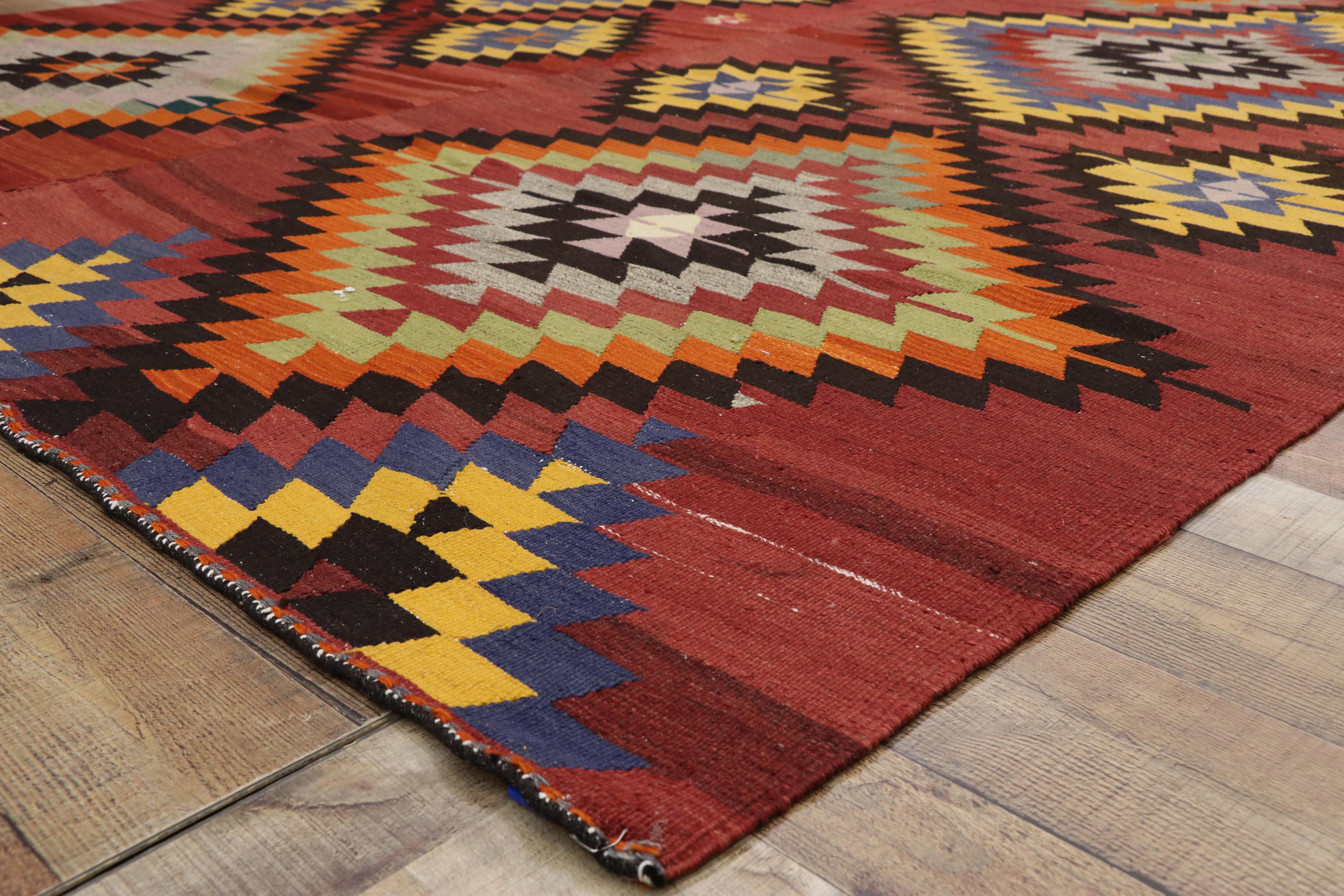 Hand-Woven Distressed Vintage Turkish Kilim Area Rug with Aztec Southwest Navajo Style For Sale