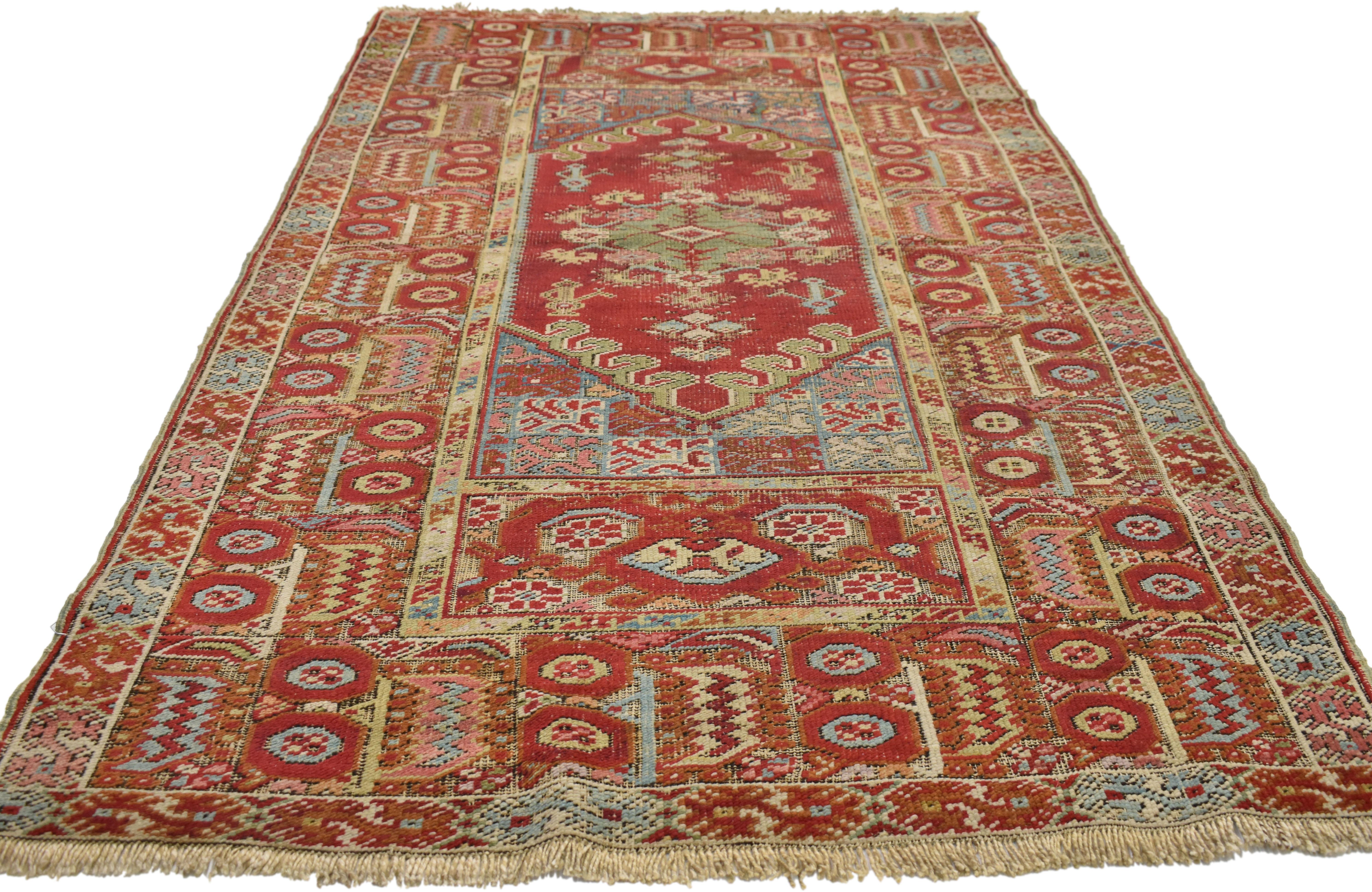 Hand-Knotted Distressed Vintage Turkish Oushak Accent Rug with Industrial Tribal Style For Sale