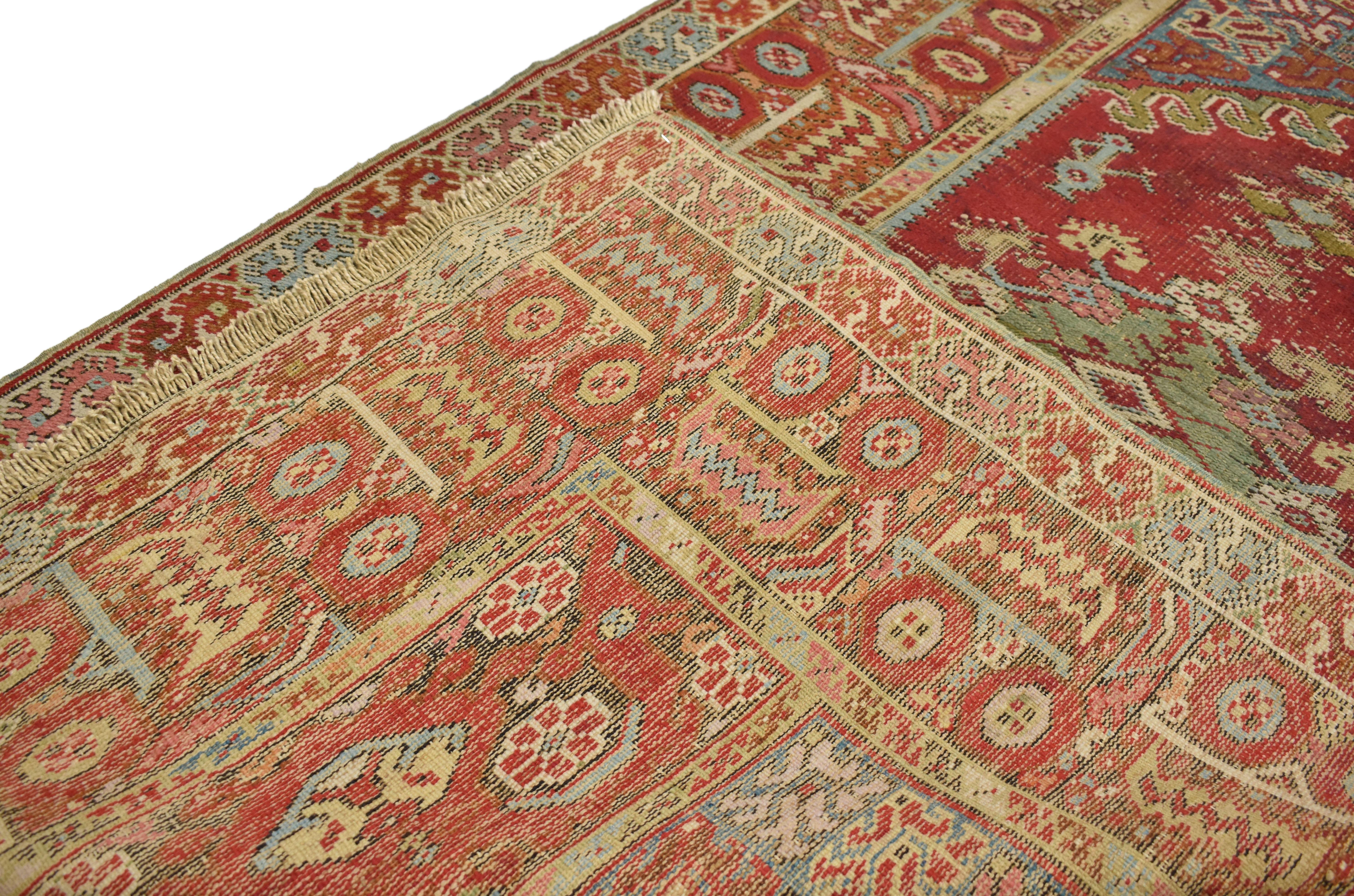 20th Century Distressed Vintage Turkish Oushak Accent Rug with Industrial Tribal Style For Sale