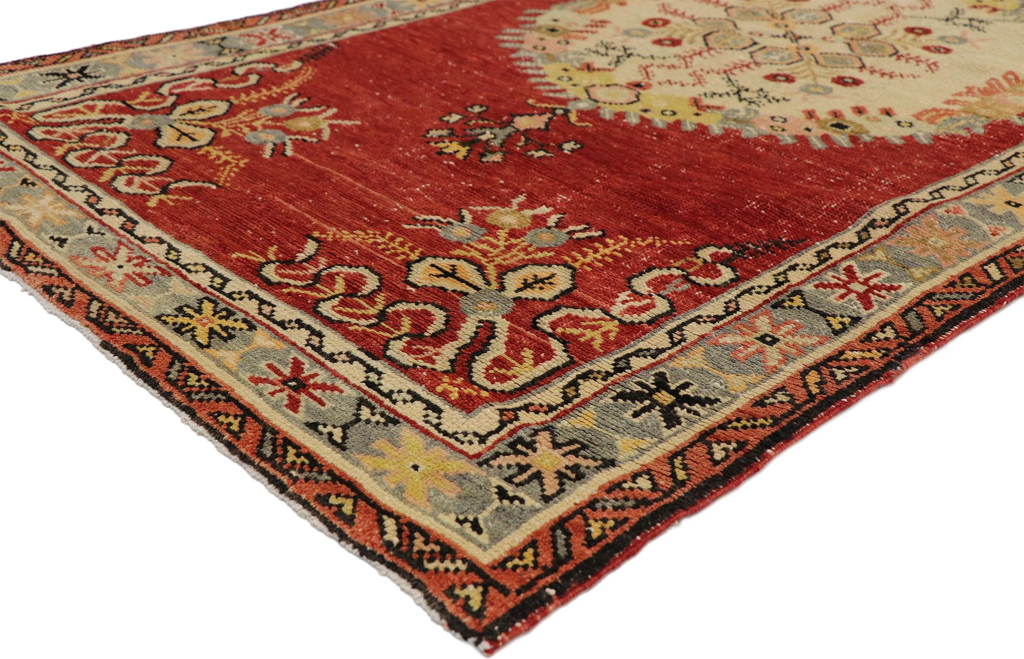 51175, distressed vintage Turkish Oushak Hallway runner with rustic French Rococo style. This hand knotted wool distressed vintage Turkish Oushak runner features three round central medallions filled with stylized geometric flowers to the centre.