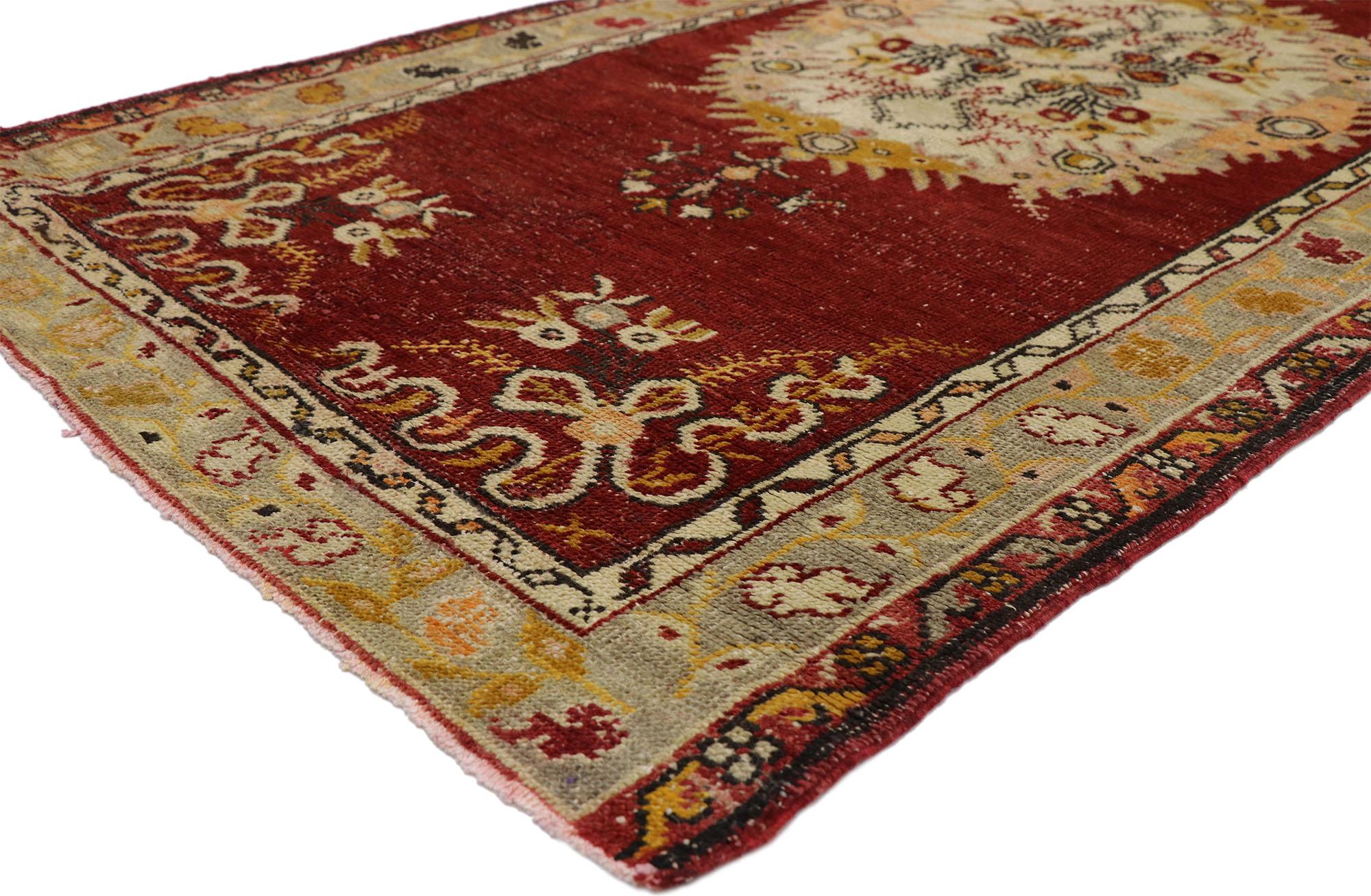 51202, distressed vintage Turkish Oushak hallway runner with rustic French Rococo style. This hand knotted wool distressed vintage Turkish Oushak runner features three round central medallions filled with stylized geometric flowers to the centre.