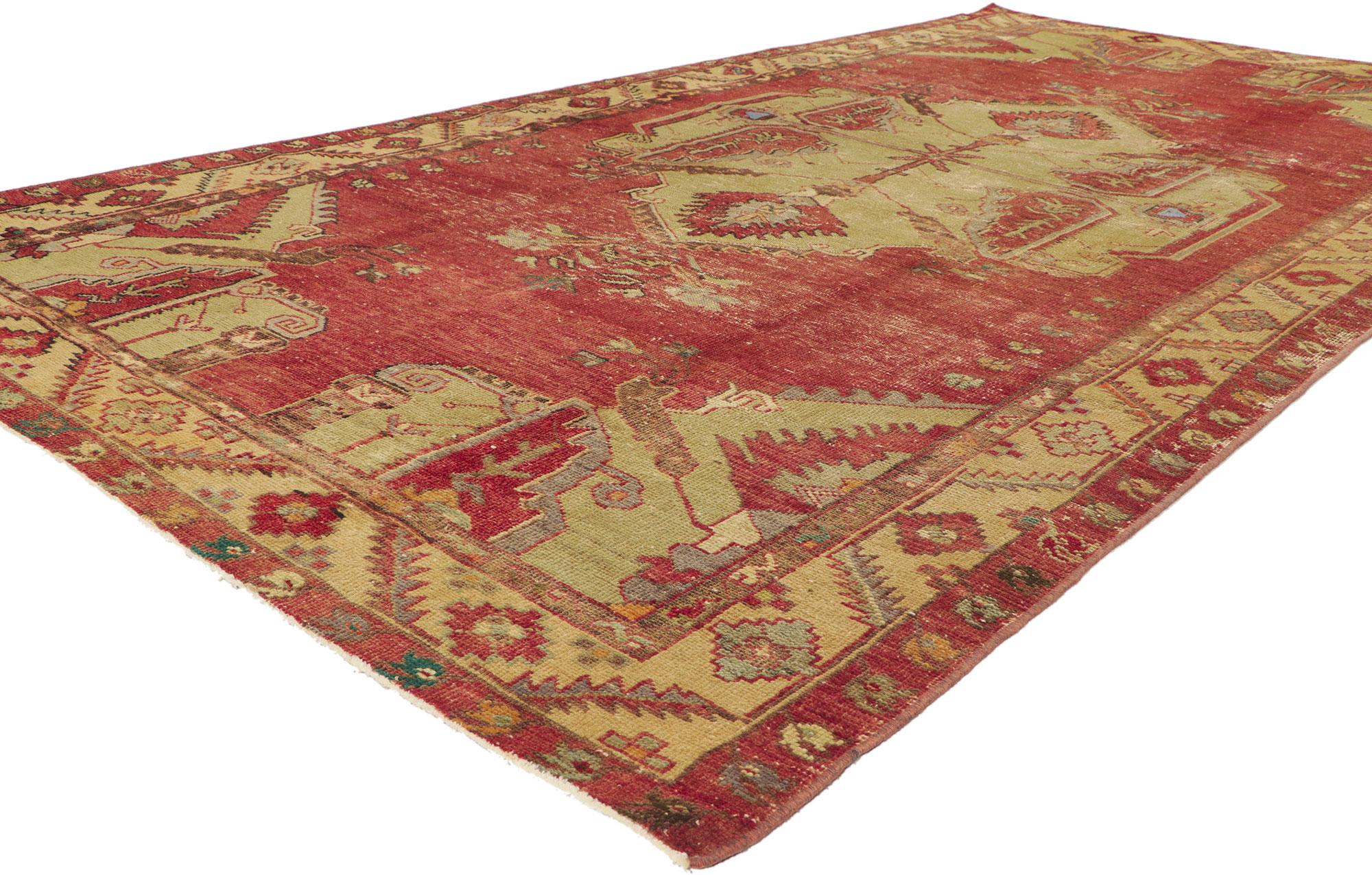 51727 Vintage Turkish oushak rug, 05'03 x 10'04.
Emanating rustic sensibility with incredible detail and texture, this hand knotted wool vintage Turkish Oushak rug is a captivating vision of woven beauty. The eye-catching medallion design and