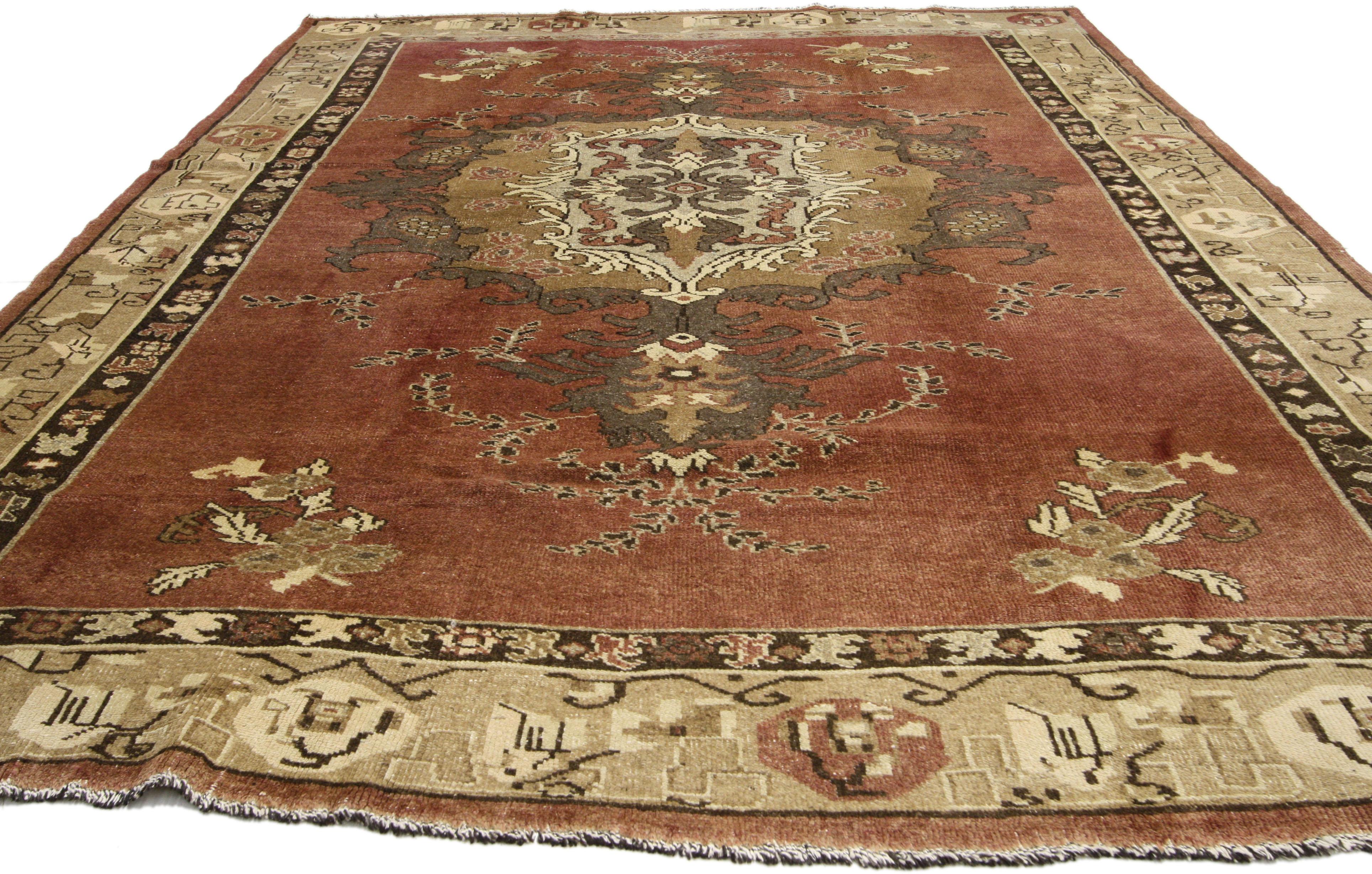 20th Century Distressed Vintage Turkish Oushak Rug with Rustic Artisan Style For Sale