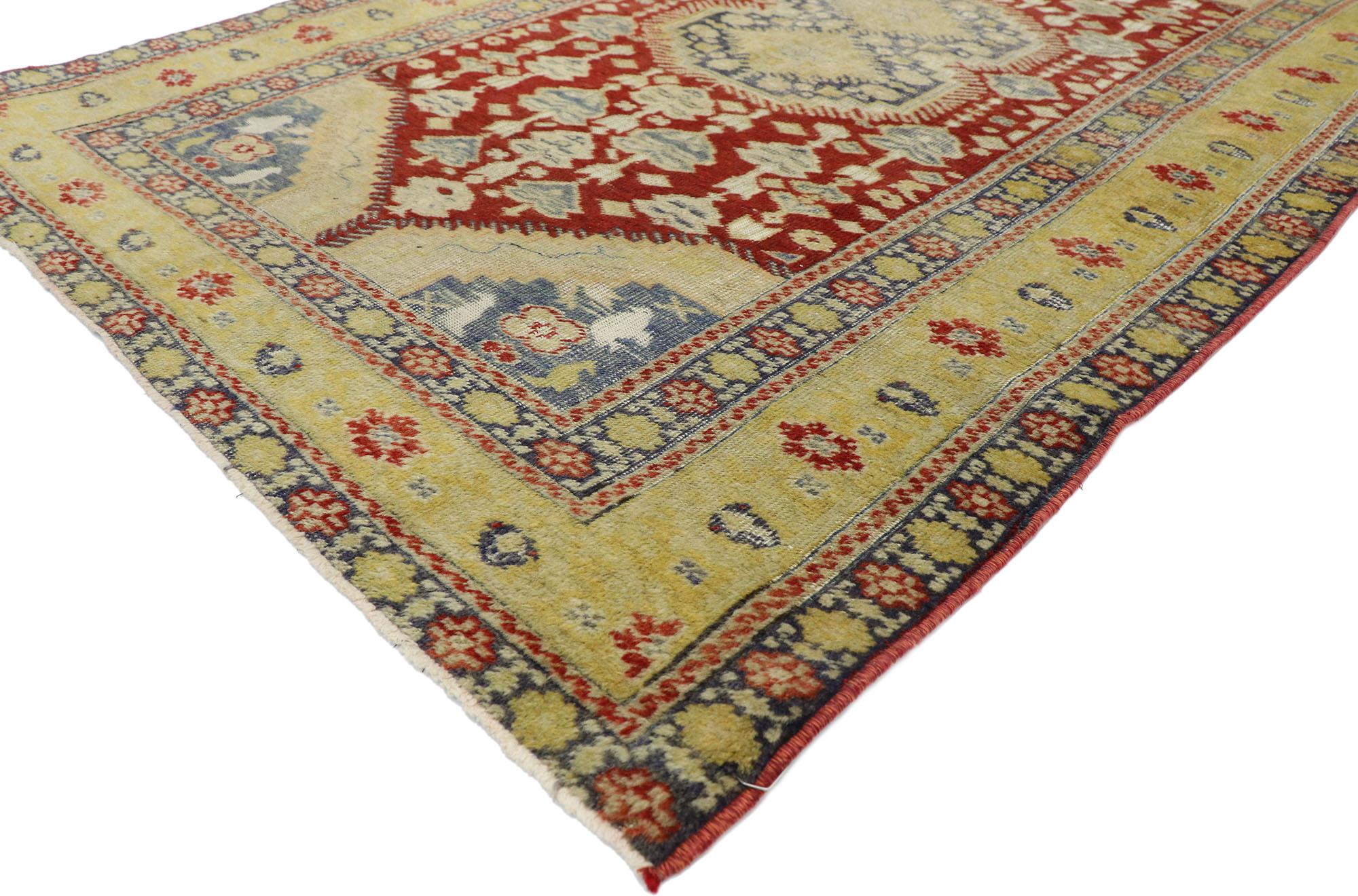 52778, distressed vintage Turkish Oushak rug with Rustic Modern Lodge style. Rusticity meets timeless Anatolian tradition in this hand knotted wool distressed vintage Turkish Oushak rug. It features a double stacked medallion outlined with spiked