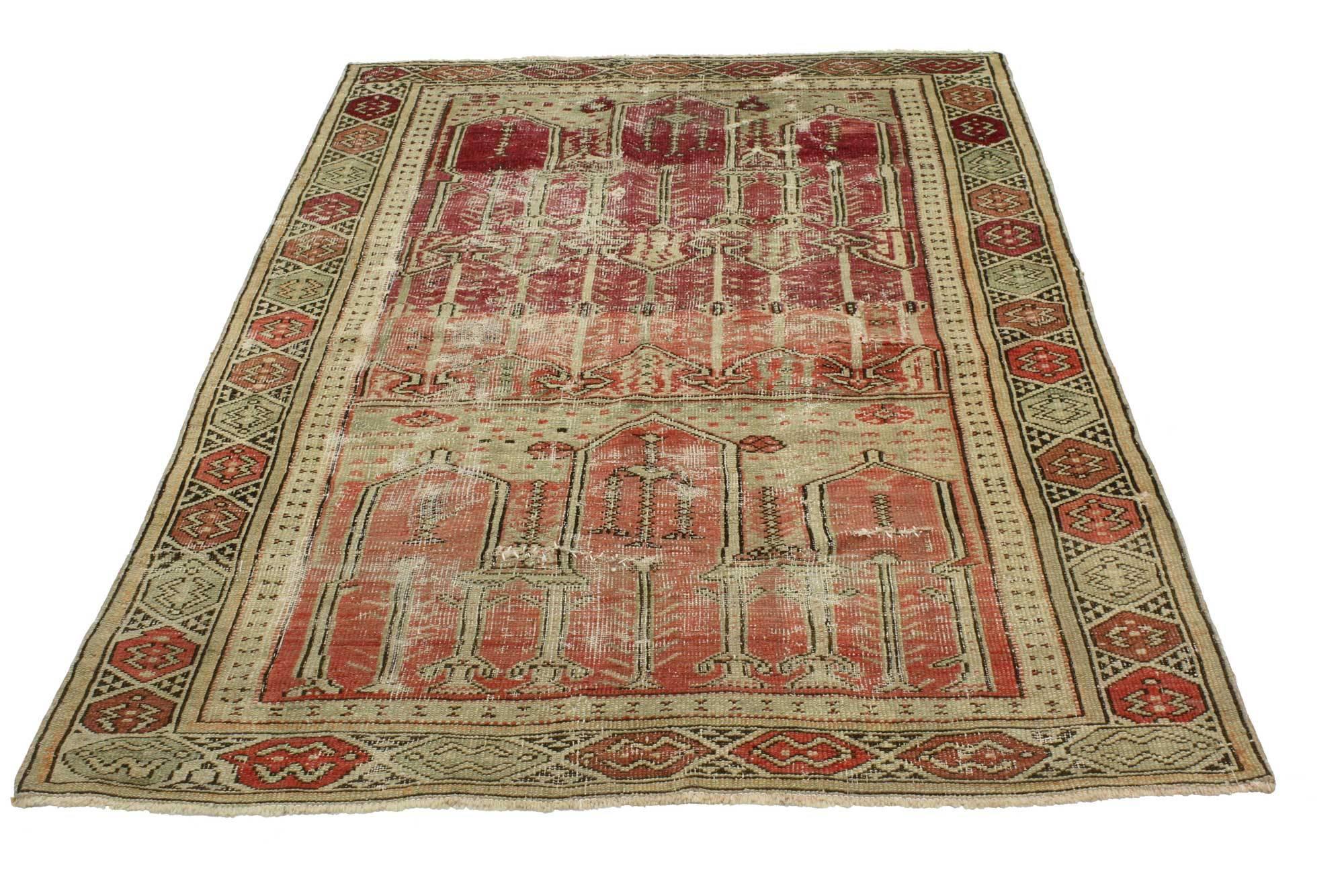 51690 distressed vintage Turkish Oushak rug with rustic style. Mysterious and atmospheric with Bohemian allure, this distressed vintage Turkish Oushak rug enchants us with its Gothic forms and earthy, sober color way. With desirable wear adding