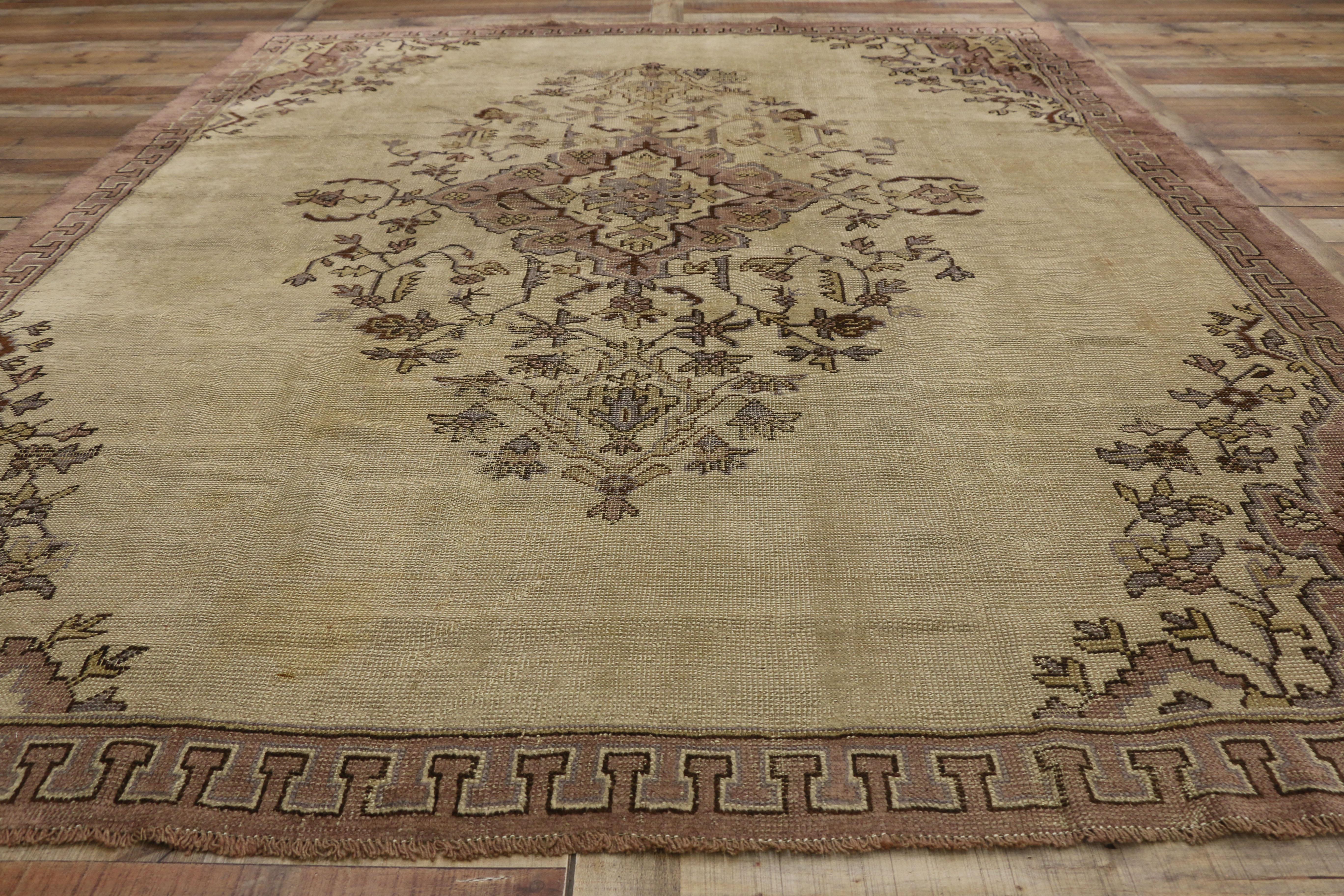 Wool Distressed Vintage Turkish Oushak Rug with Shabby Chic Rococo Style For Sale