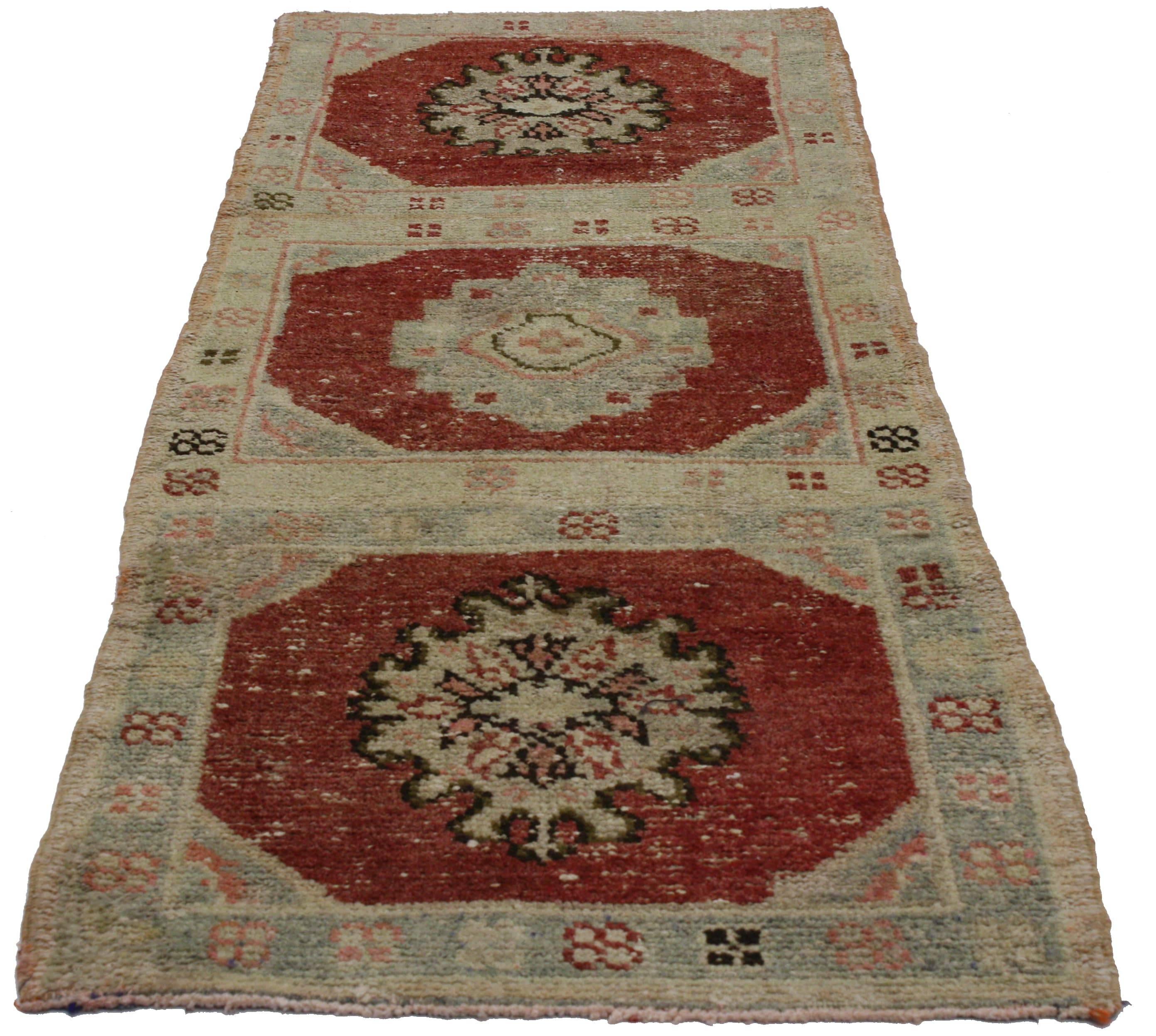 51561 Distressed Vintage Turkish Oushak Runner, Entry or Foyer Rug with Rustic Style. This hand knotted wool distressed vintage Turkish Oushak runner features three connected square panels with floral motifs. Each panel contains a large palmette in