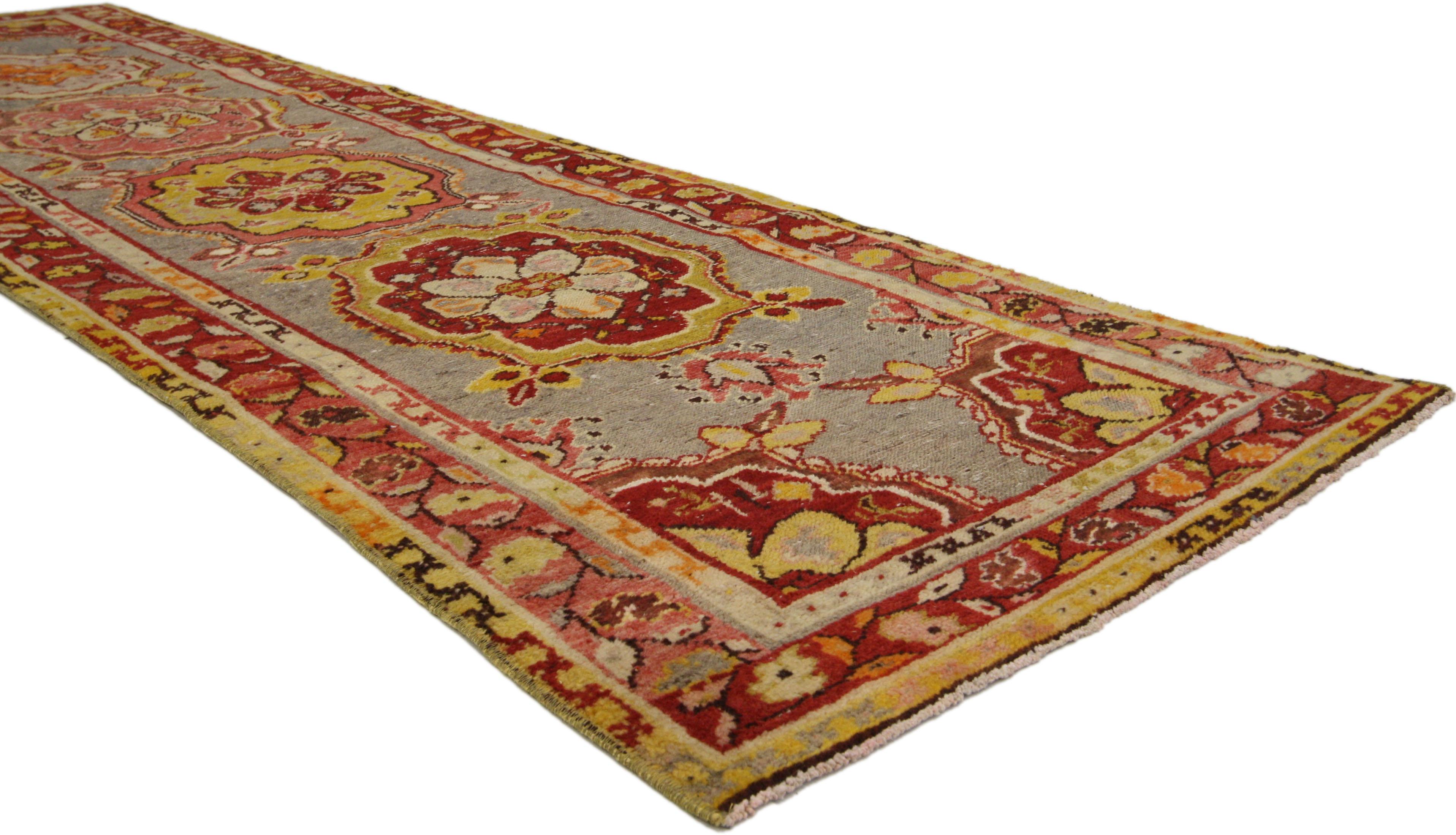 52296 Distressed Vintage Turkish Oushak Runner with Rustic Jacobean Style 02’10 x 09’11. Soft and sumptuous, this hand knotted wool distressed vintage Turkish Oushak rug with Jacobean style brings regal allure and rusticity to any interior it