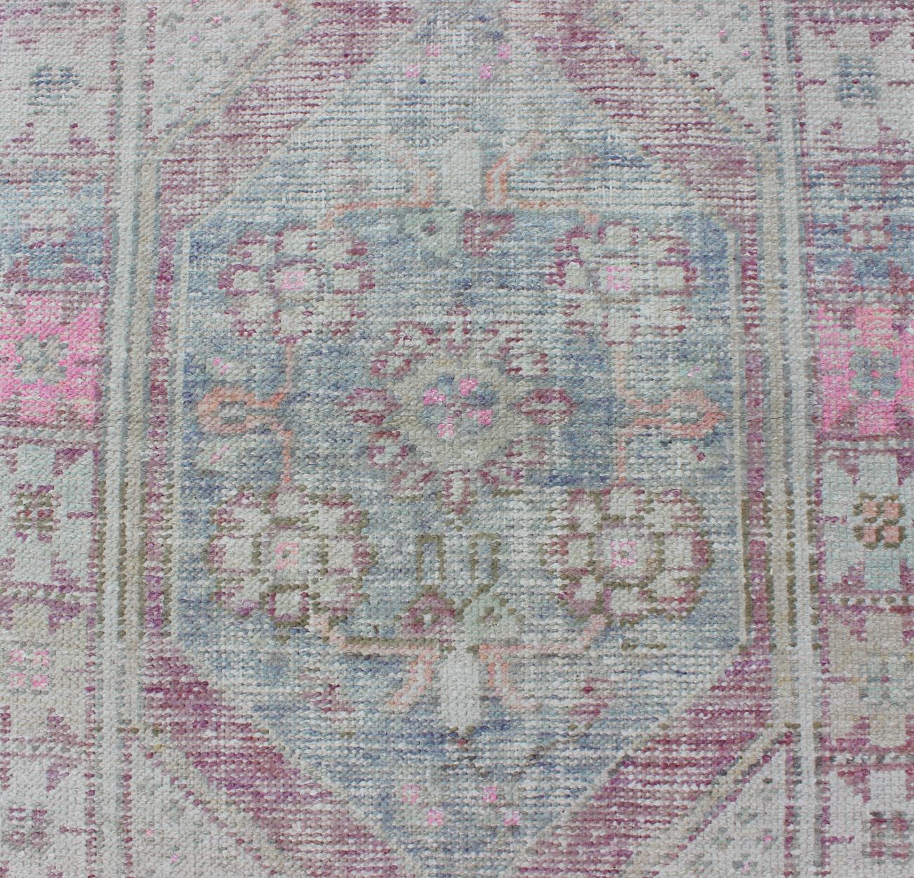 20th Century Distressed Vintage Turkish Oushak Runner in Light Purple, Light Green and Blue For Sale