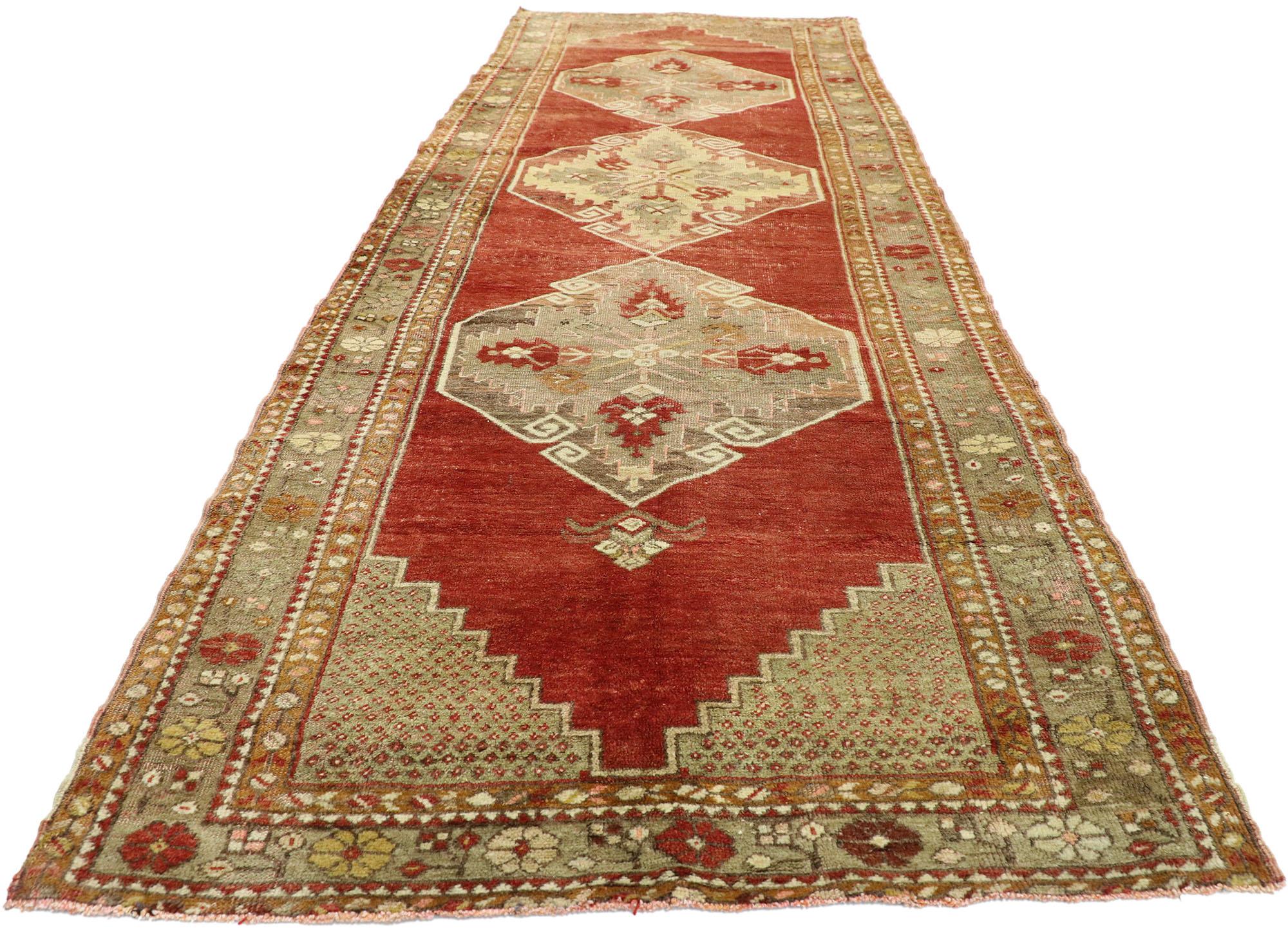 Hand-Knotted Distressed Vintage Turkish Oushak Runner with English Manor House Tudor Style For Sale